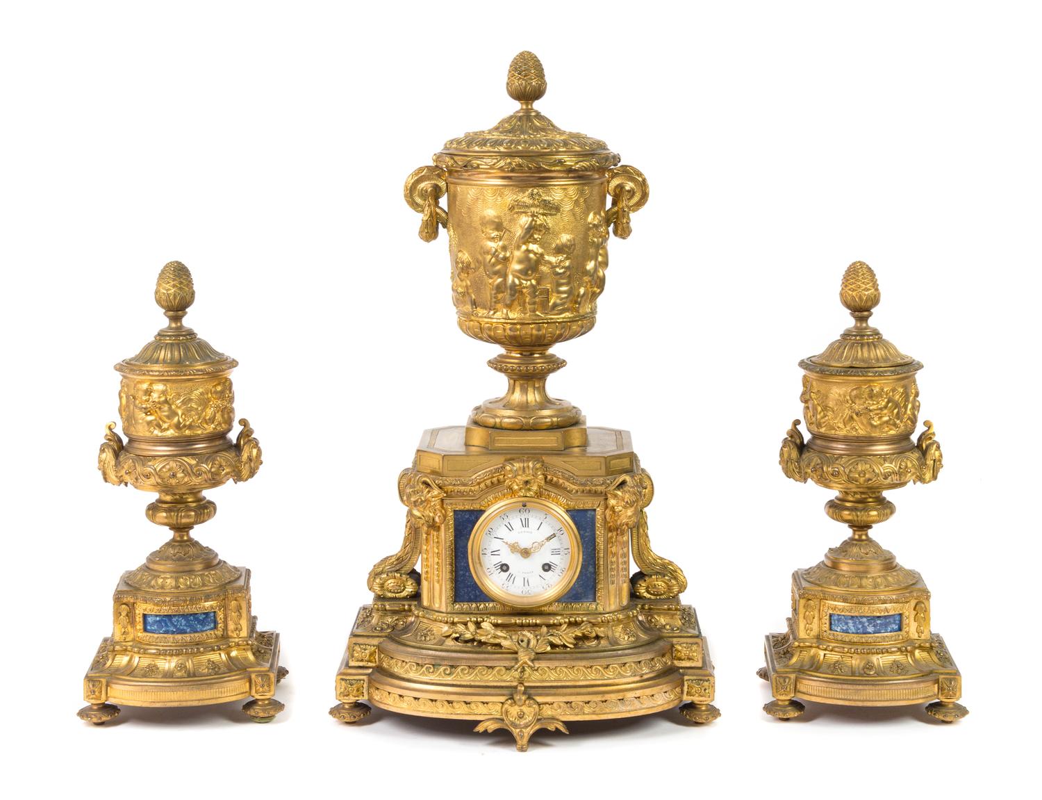 A Louis XVI Style Lapis Lazuli Inset Gilt Bronze Clock Garniture Height of mantel clock 23 3/4 inches. — 20TH CENTURY