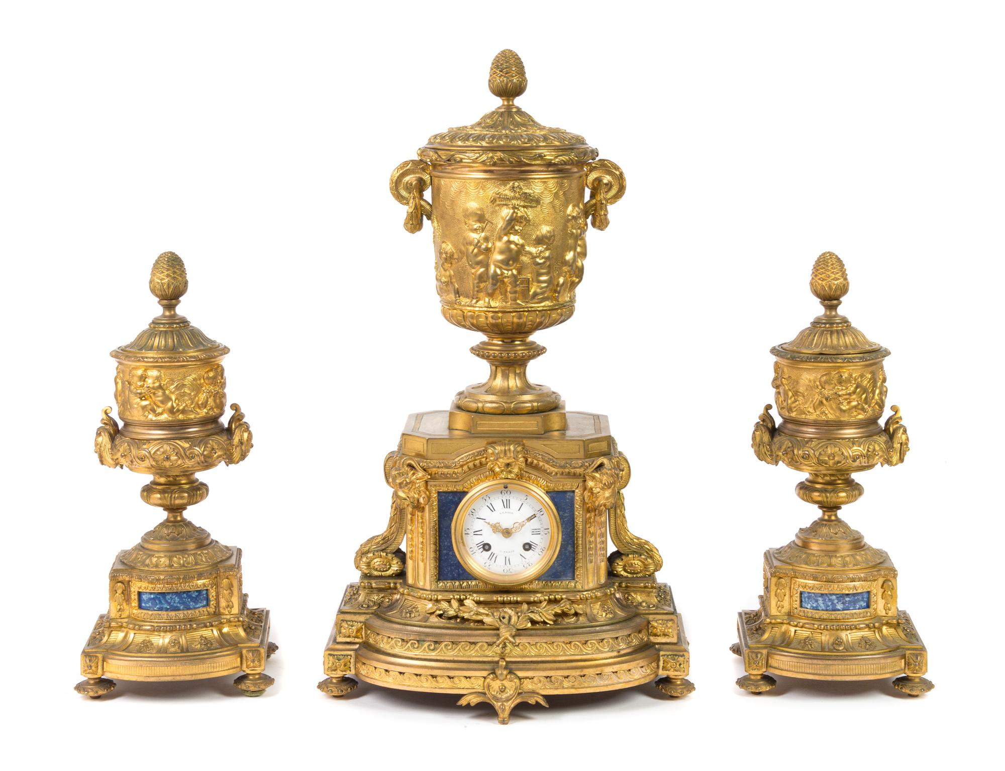 A Louis XVI Style Lapis Lazuli Inset Gilt Bronze Clock Garniture Height of mantel clock 23 3/4 inches. — 20TH CENTURY