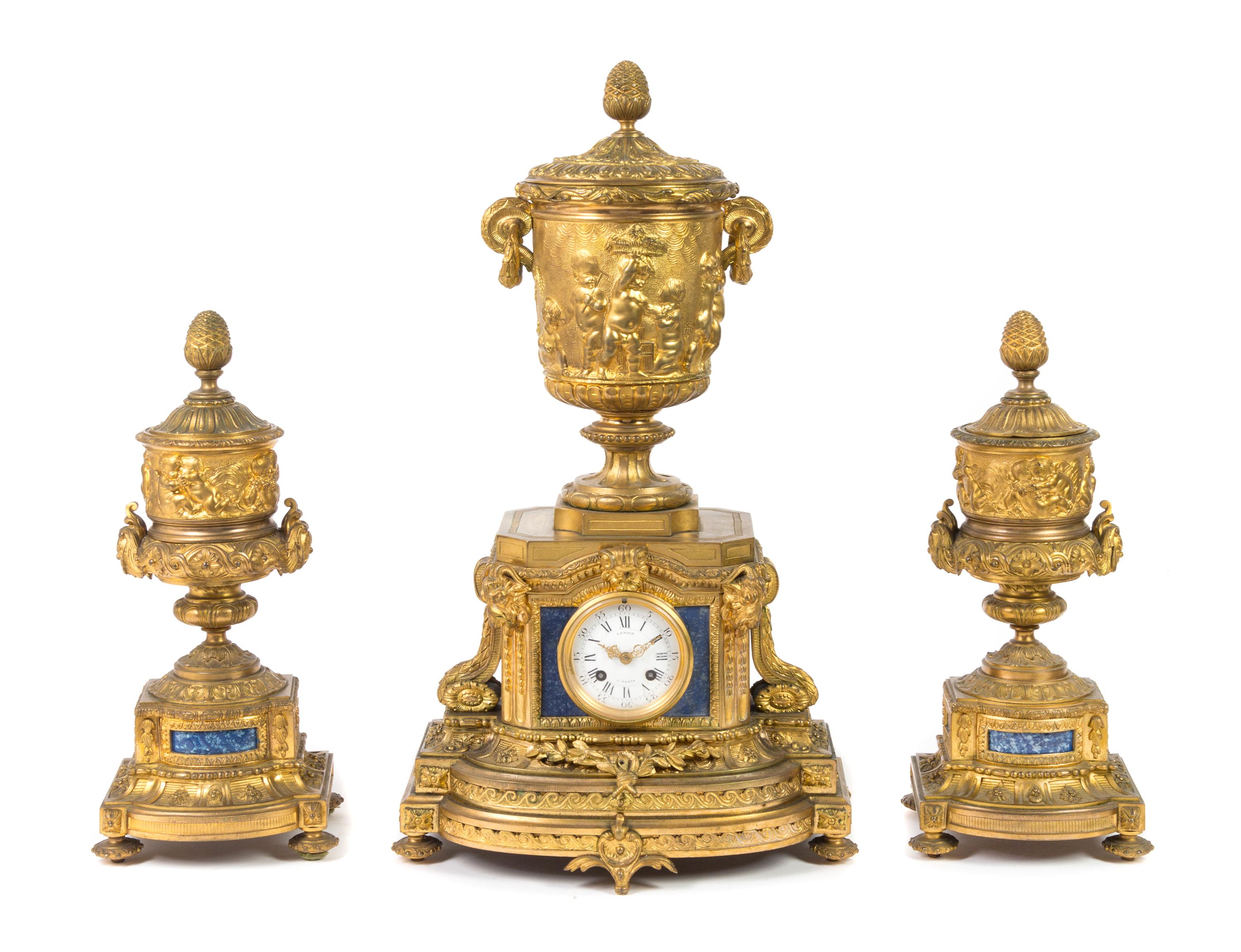 A Louis XVI Style Lapis Lazuli Inset Gilt Bronze Clock Garniture Height of mantel clock 23 3/4 inches. — 20TH CENTURY