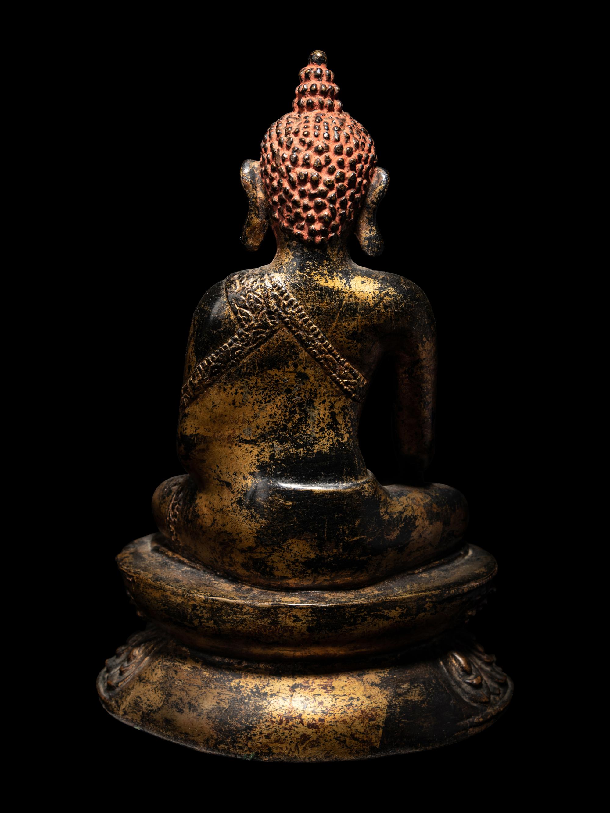 A Large Nepalese Gilt Bronze Figure of Seated Buddha