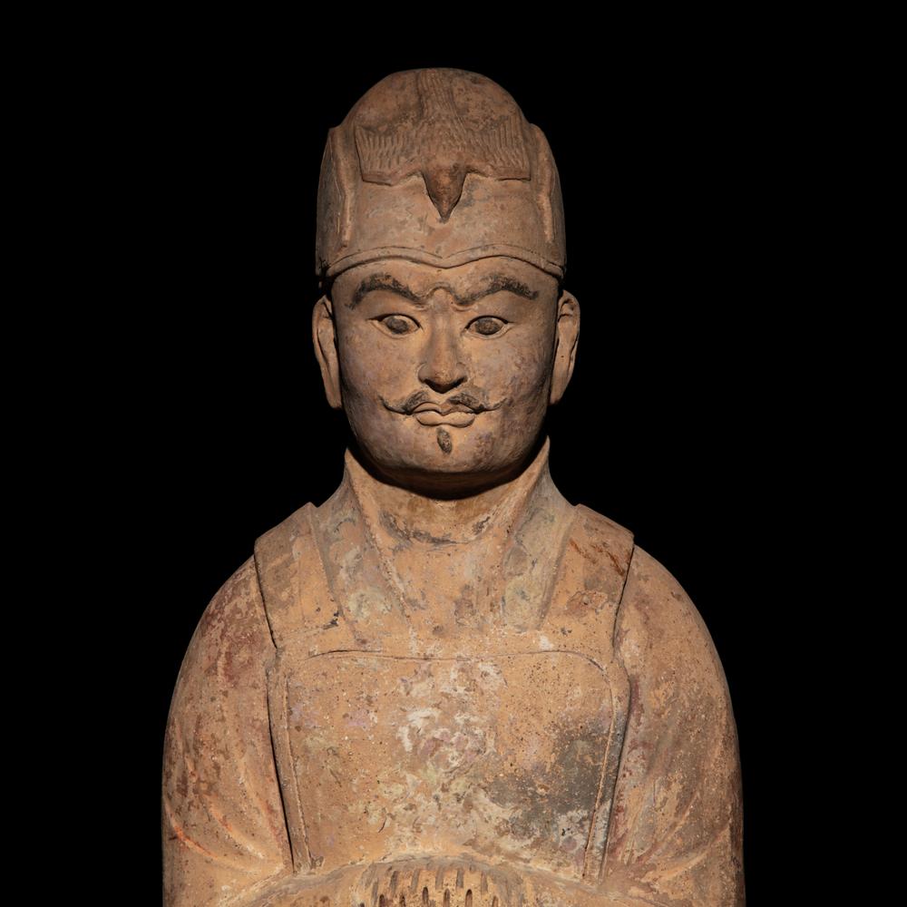 A Chinese Painted Pottery Standing Official, Tang Dynasty