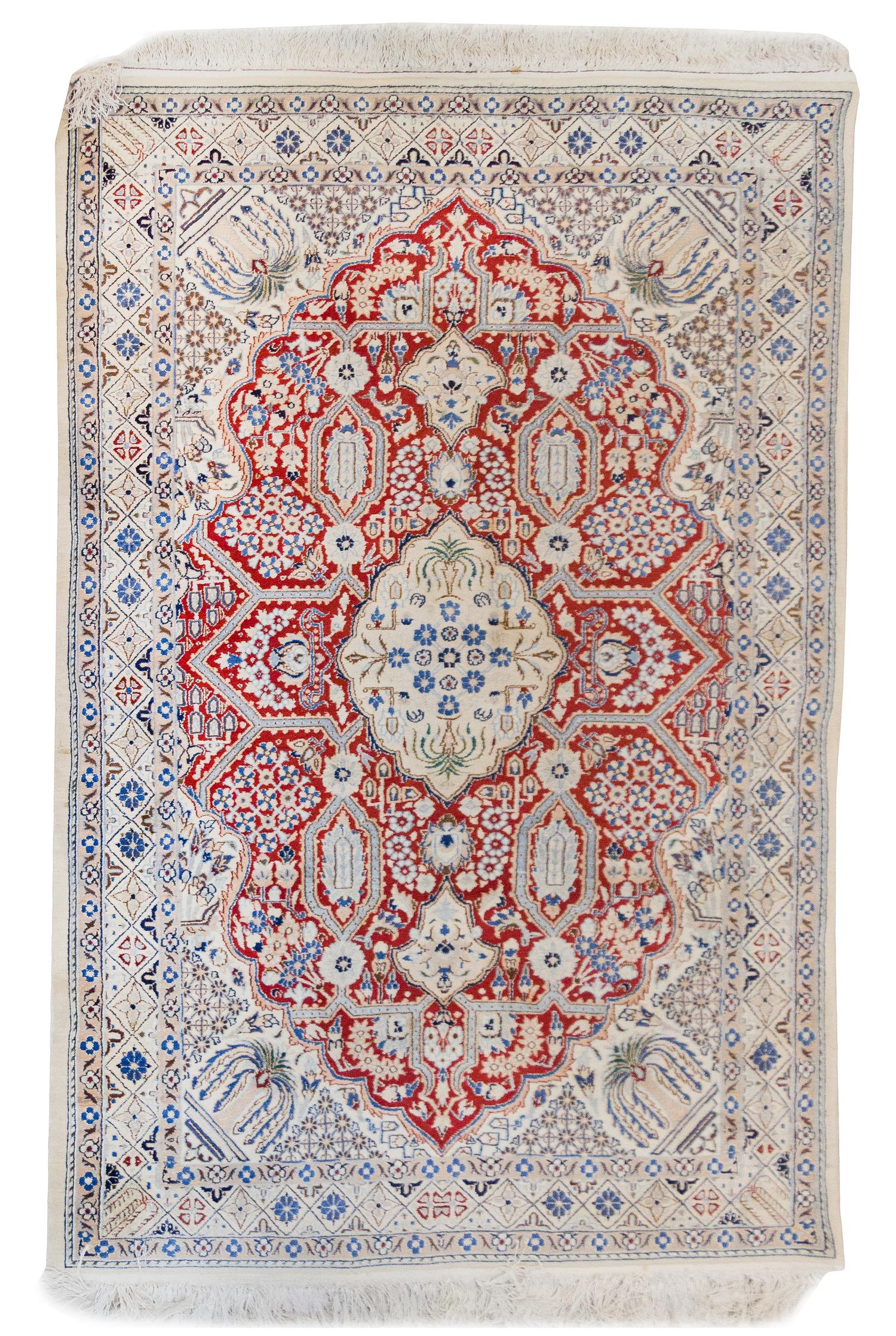 A Persian Wool Rug 6 feet 2 inches x 3 feet 7 3/4 inches.