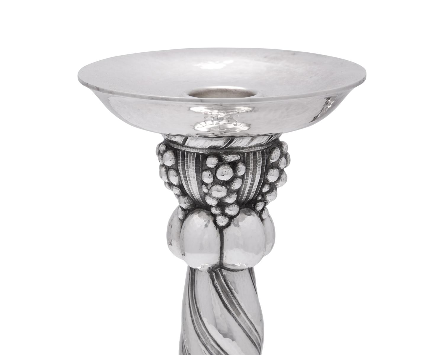 A Set of Four Georg Jensen Grapevine Silver Candlesticks