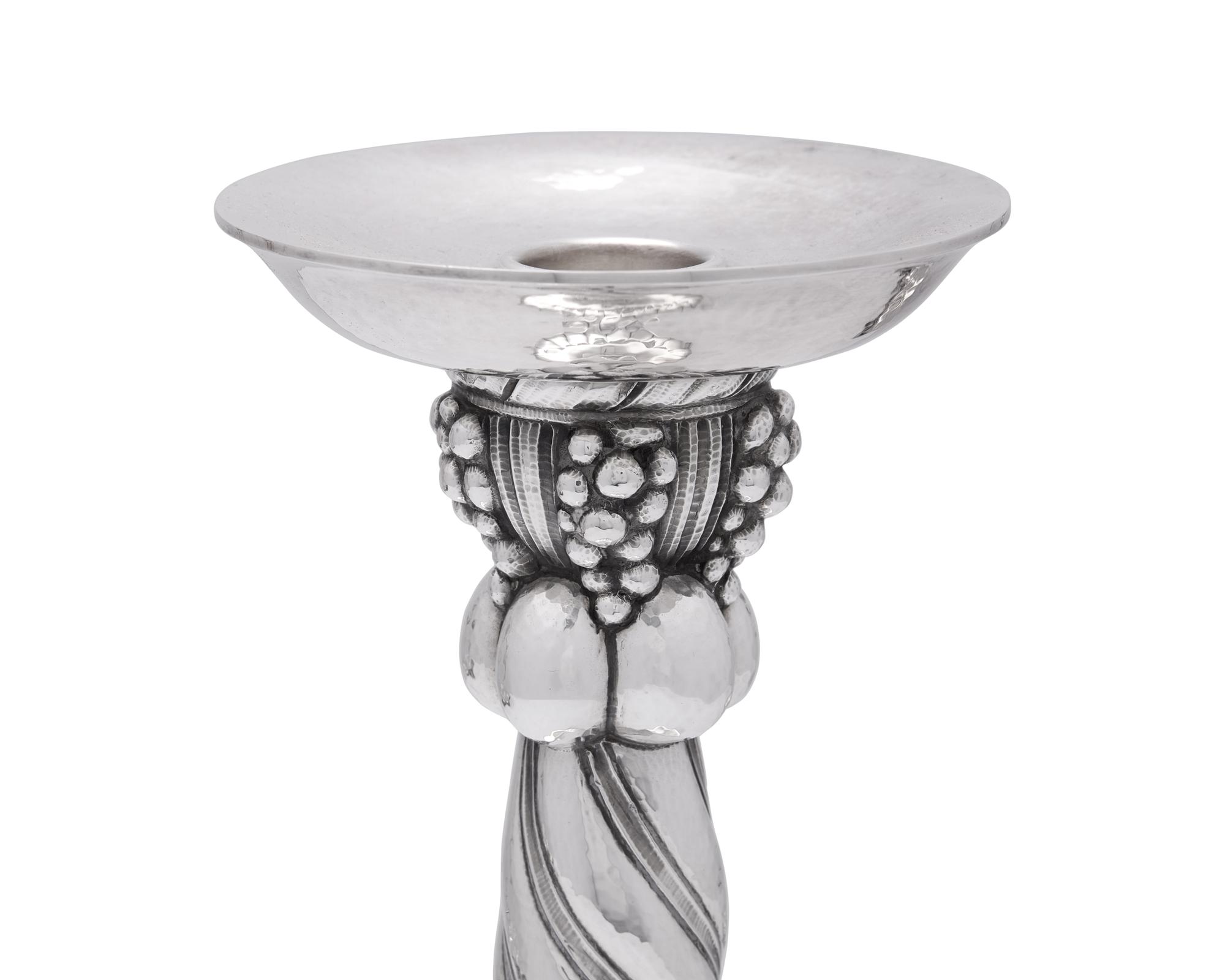 A Set of Four Georg Jensen Grapevine Silver Candlesticks
