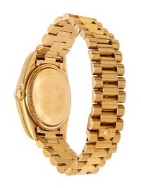 ROLEX, REF. 18038 18K YELLOW GOLD 'DAY-DATE' 'SINGLE QUICKSET' WATCH, WITH DESIREABLE 'WHITE ROMAN' DIAL