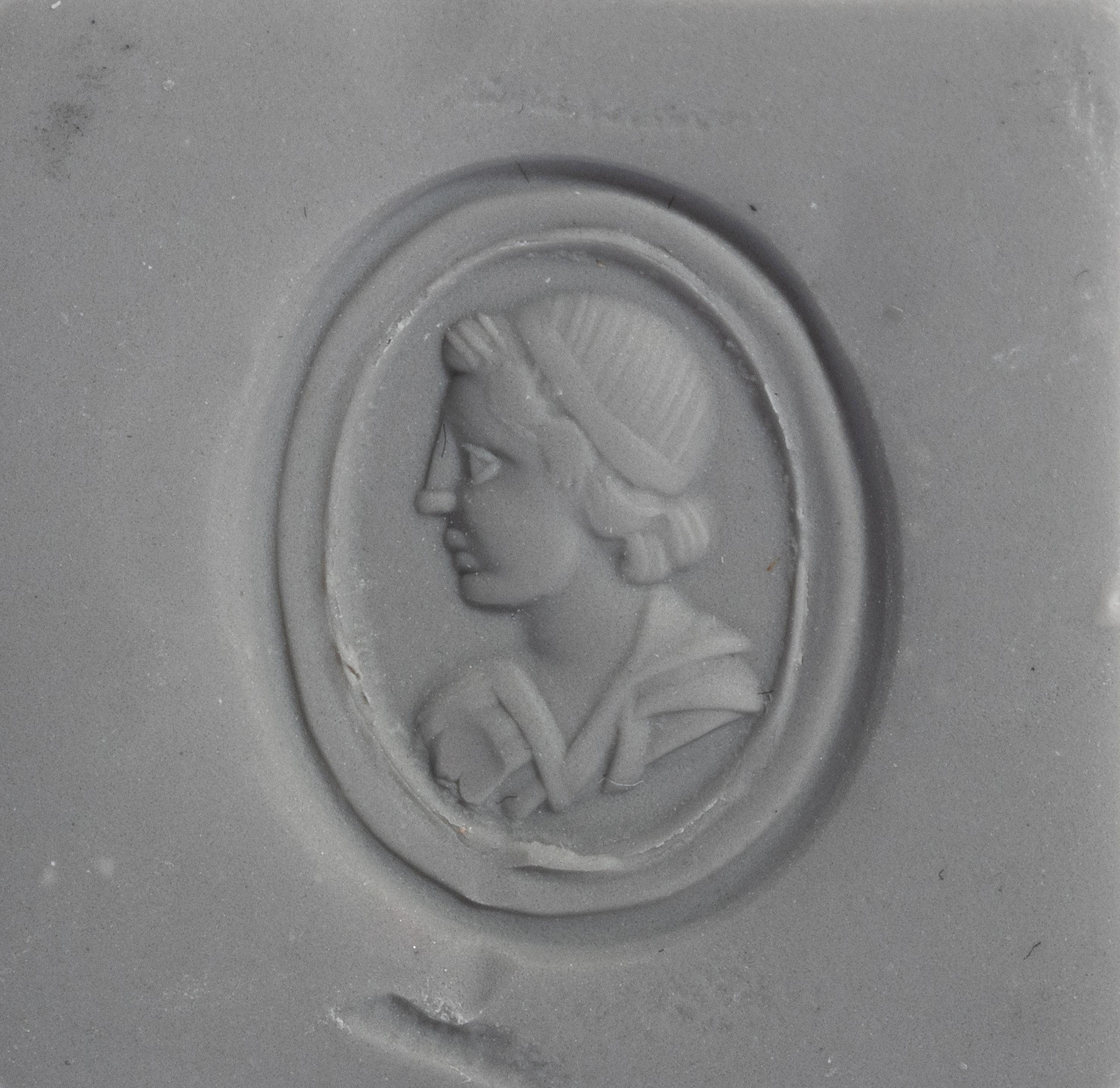 A Carnelian Finger Ring with a Male Portrait Bust, After the Antique