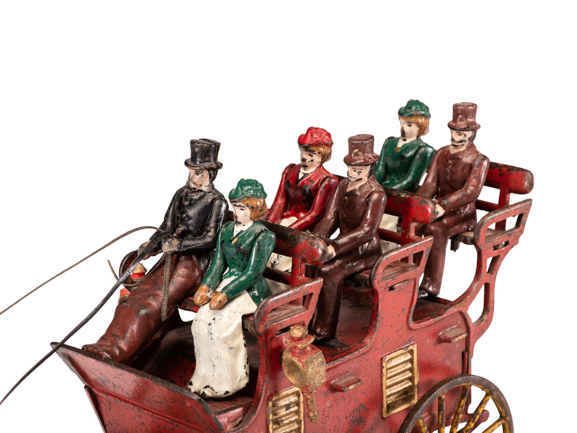 A Hubley Cast Iron Three-Seat Two-Horse Drawn Brake