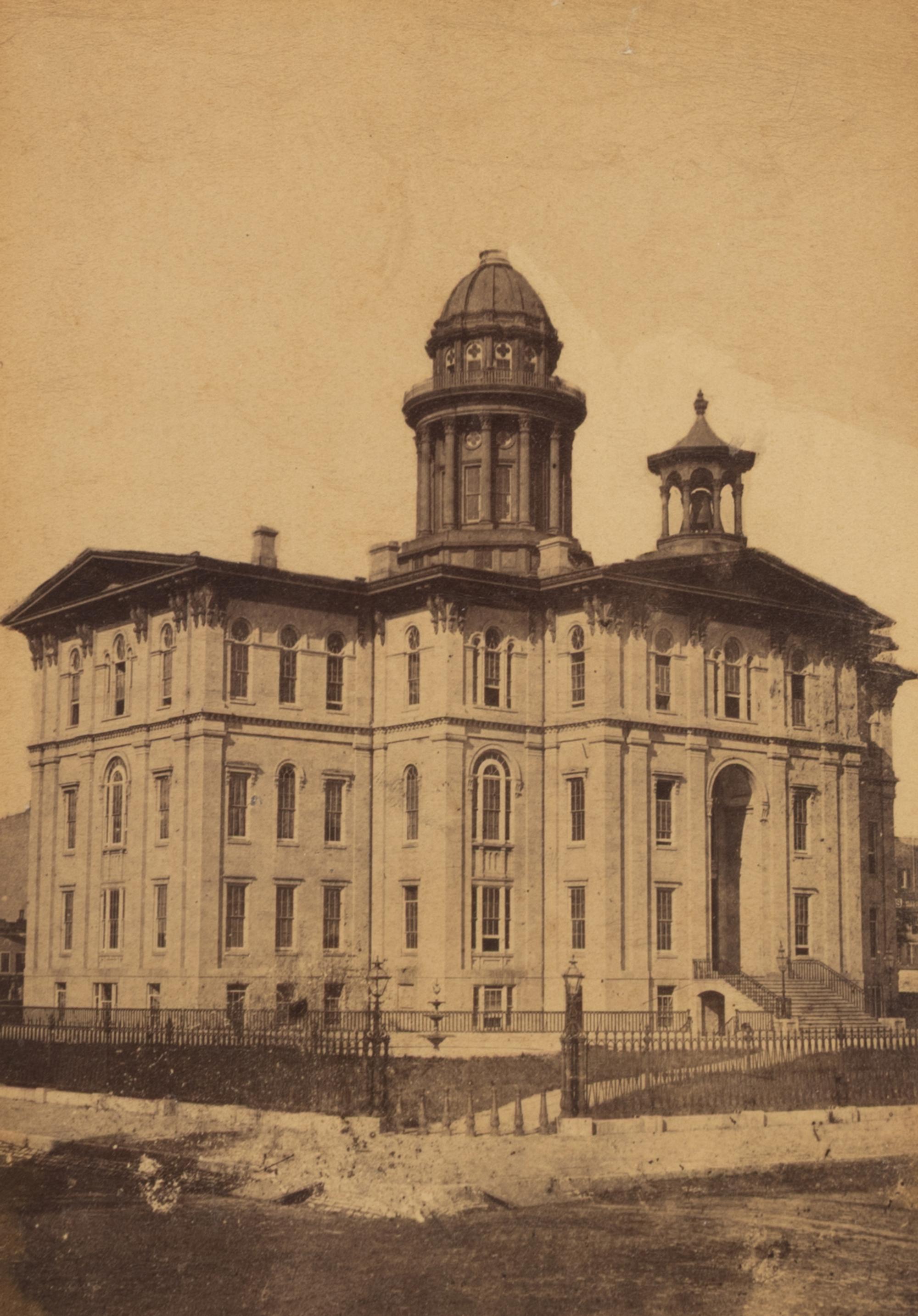 [Chicago Fire]. A group of 7 albumen prints taken before and after the 1871 Chicago Fire, comprising: