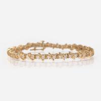 A 14K Yellow Gold and Diamond Bracelet