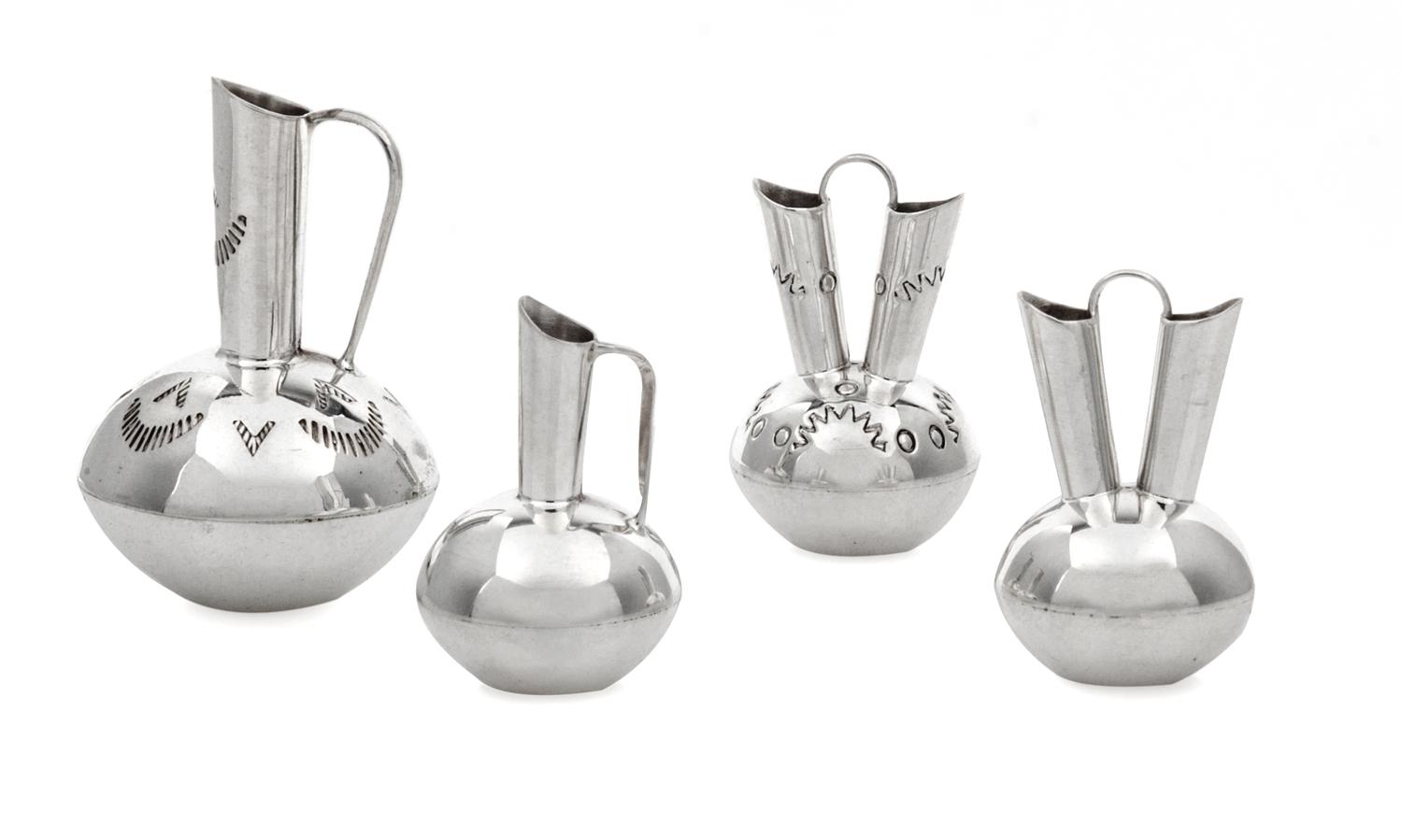 A Group of Four Native American Silver Vessels, Wesley K. Whitman, Navajo, comprising two wedding vases and a single spout ewer, togeth