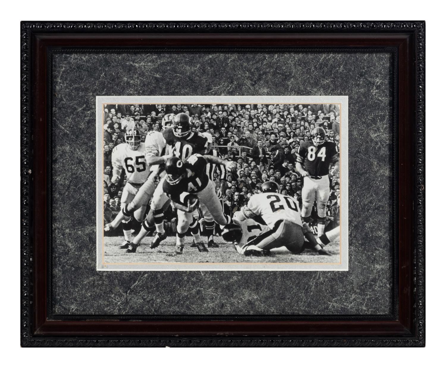 A Group of Nine Early Years of the Chicago Bears Photographs Formerly Displayed at Mike Ditka’s Restaurant.