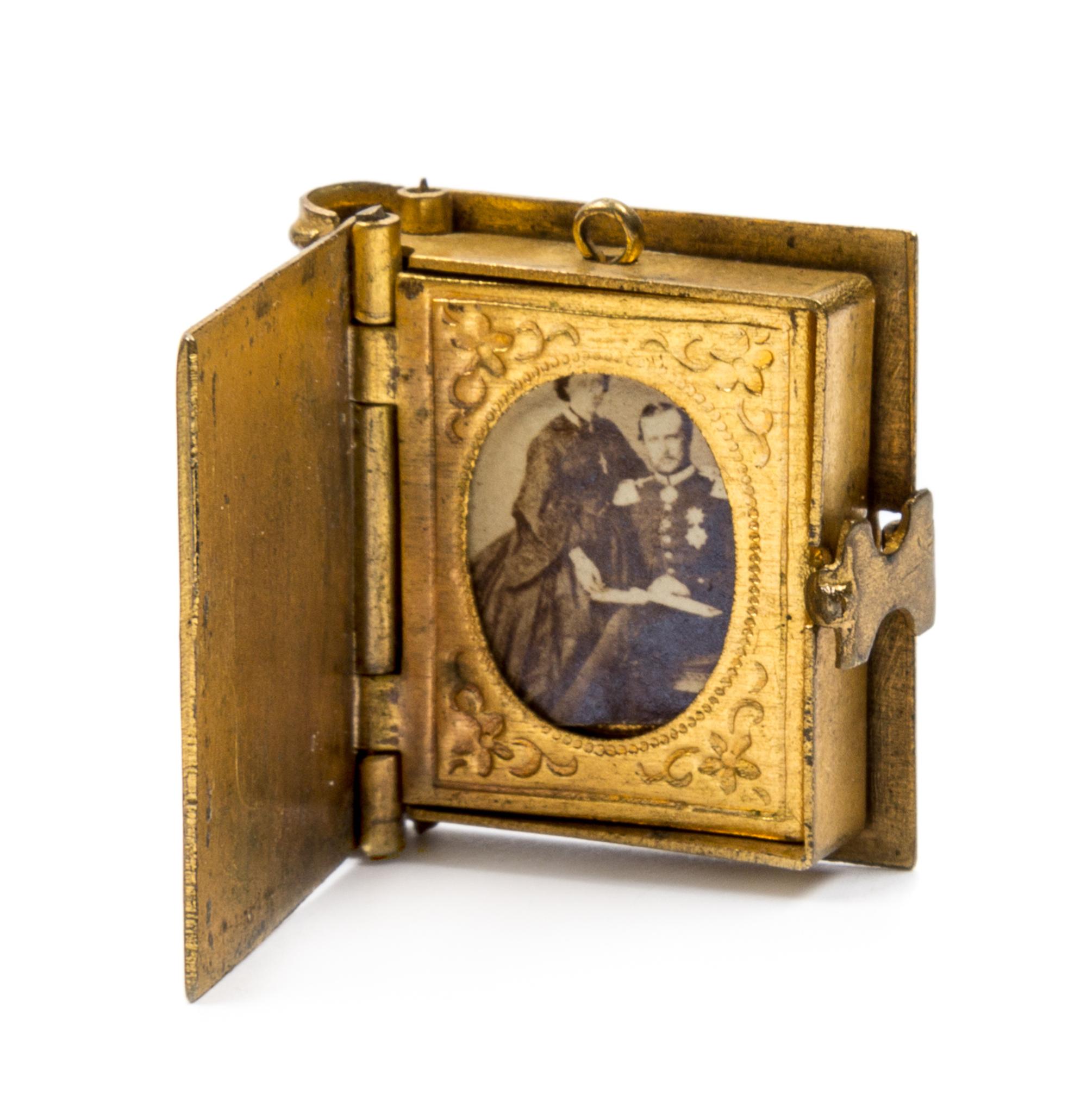 (MINIATURE BOOKS) A group of 7 miniature books.