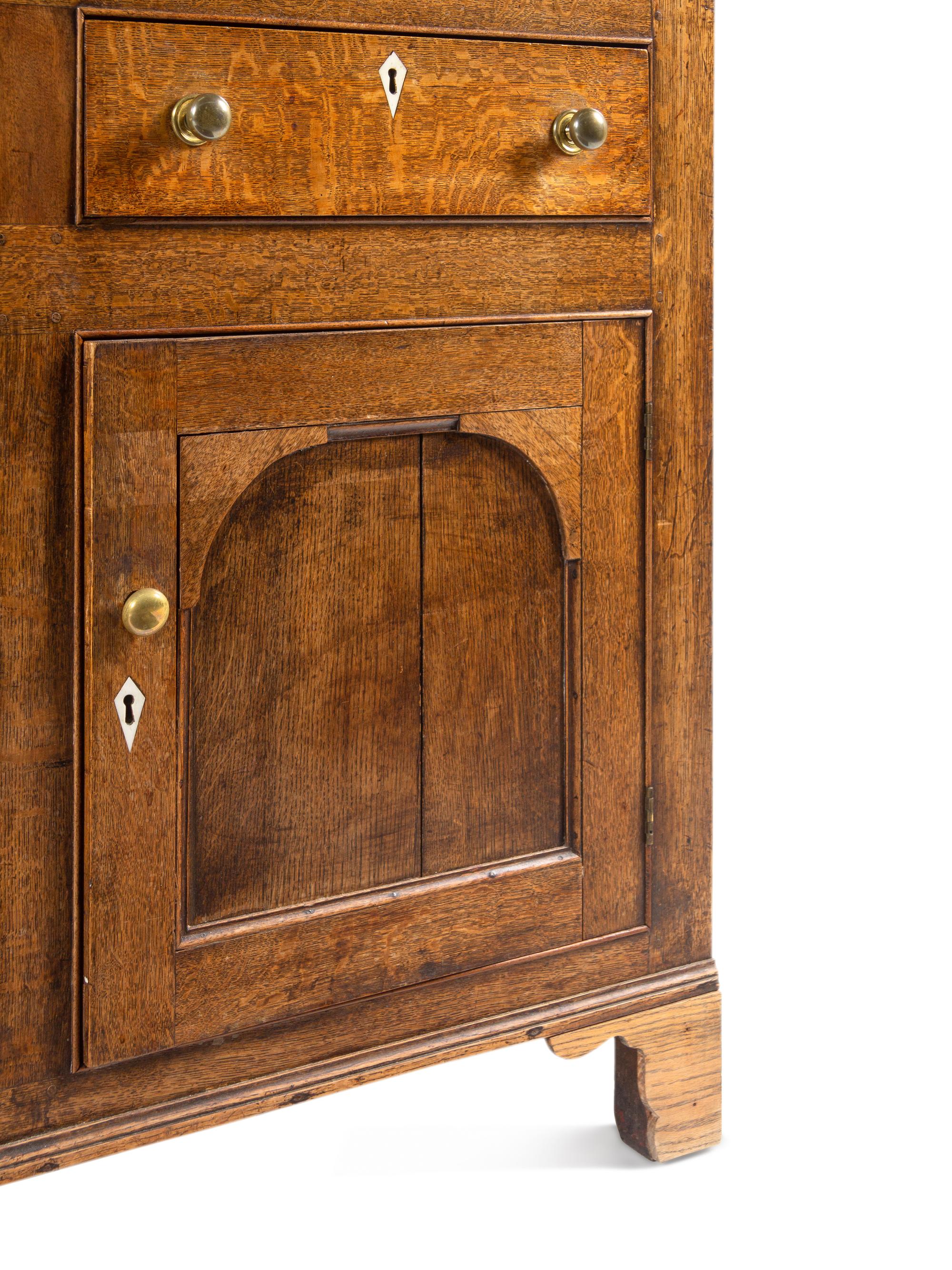 A George III Oak and Mahogany-Inlaid Cupboard