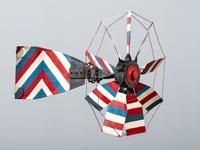 A Patriotic Red, White and Blue Painted Sheet Metal Whirligig
