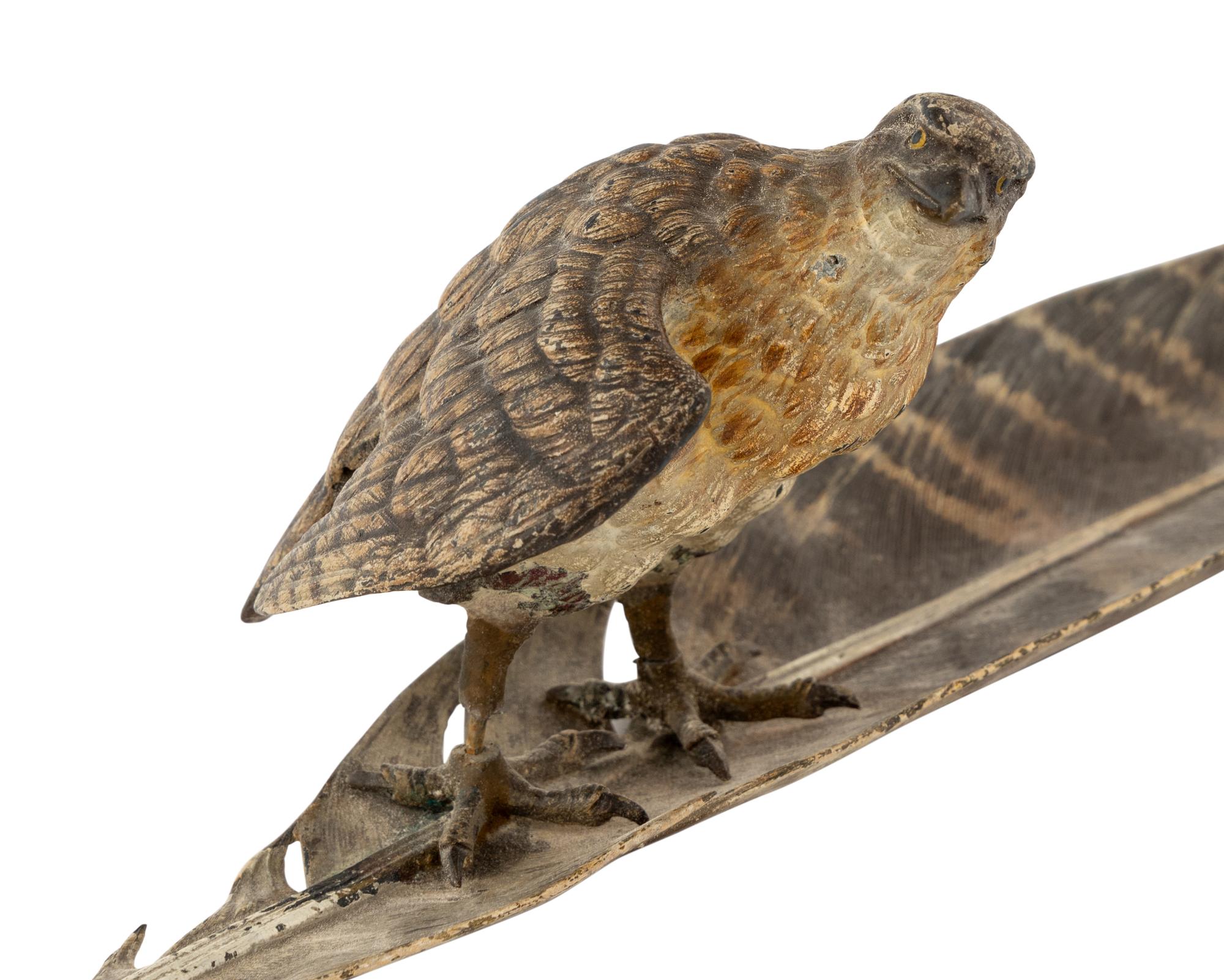 An Austrian Cold-Painted Bronze Figure of a Bird of Prey Perched on a Feather