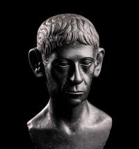A Romano-Egyptian Black Basalt Male Portrait Bust