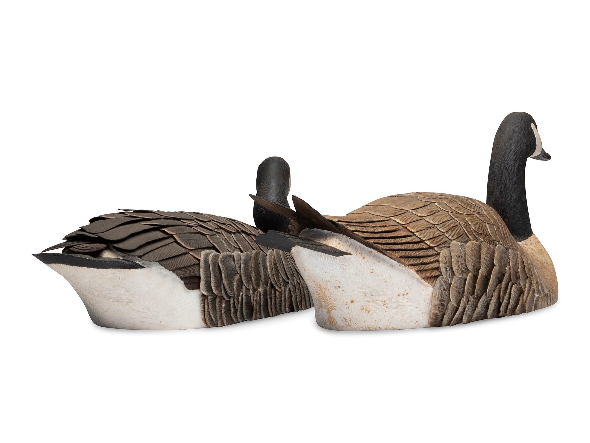 A Pair of Hollow Carved and Painted Wood Canada Goose Decoys