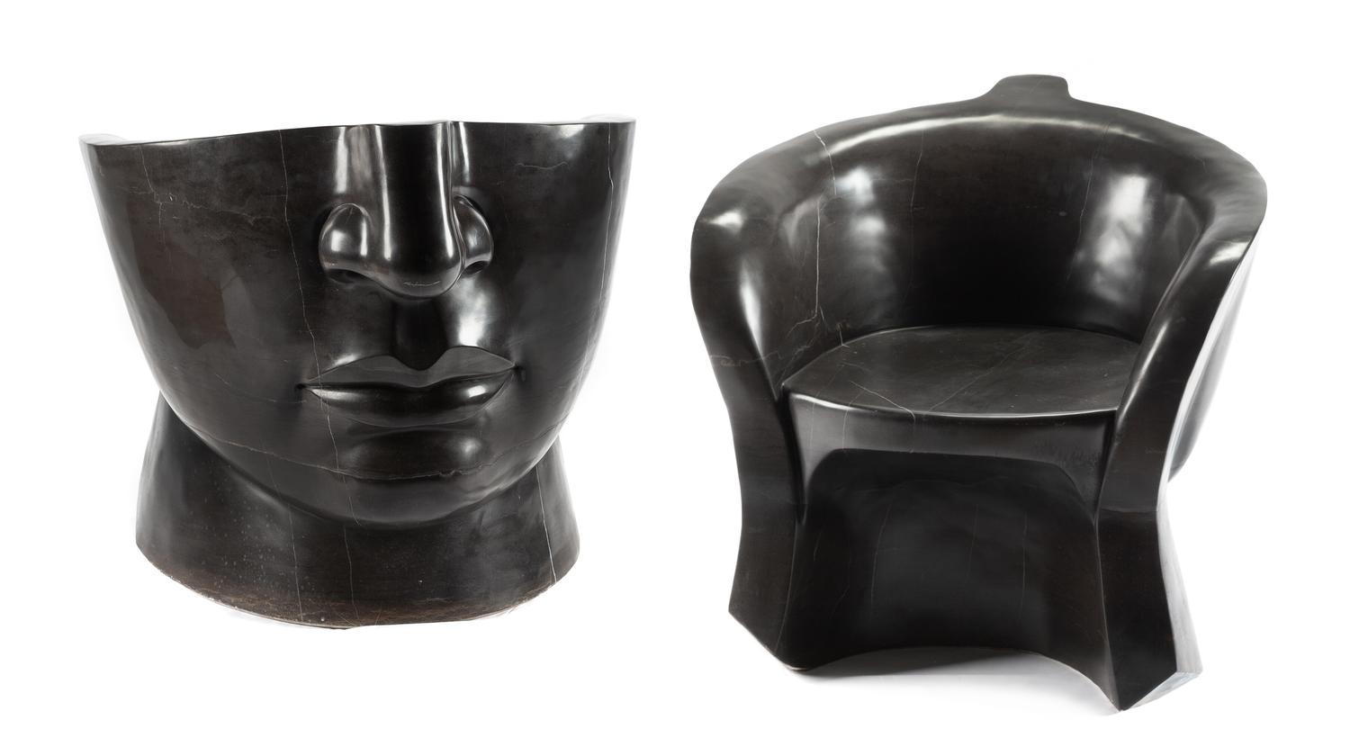A Pair of Italian Marble "Face" Chairs Height 27 x width 27 1/2 x depth 27 inches.