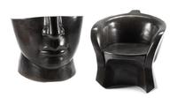 A Pair of Italian Marble "Face" Chairs Height 27 x width 27 1/2 x depth 27 inches.