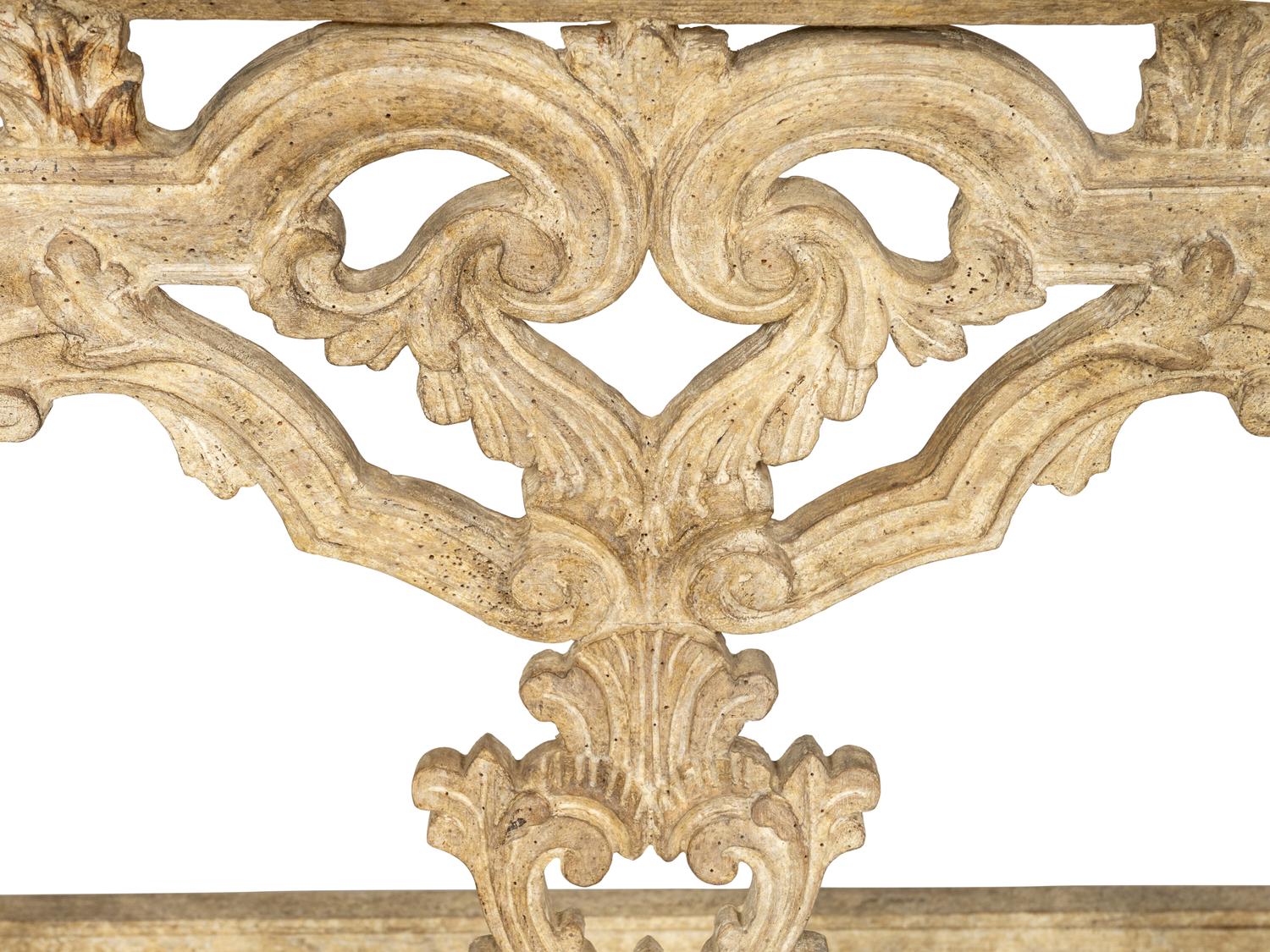 A Pair of Venetian Style Cream-Painted Marble Top Consoles