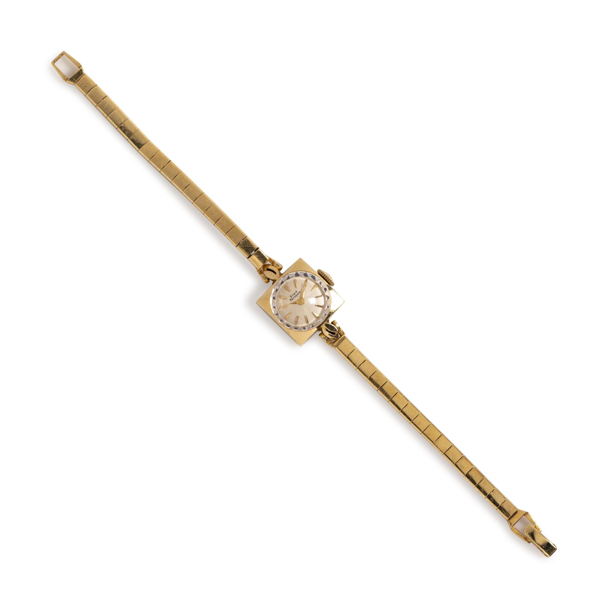 A 14 Karat Yellow Gold Wristwatch, Girard Perregaux,