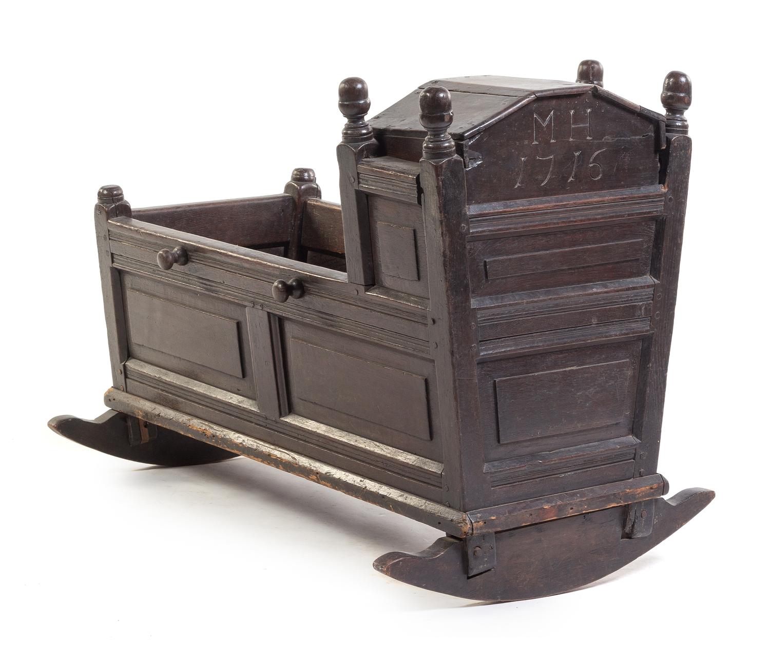 A French Oak Cradle Height 29 x width 38 inches. — 18TH CENTURY
