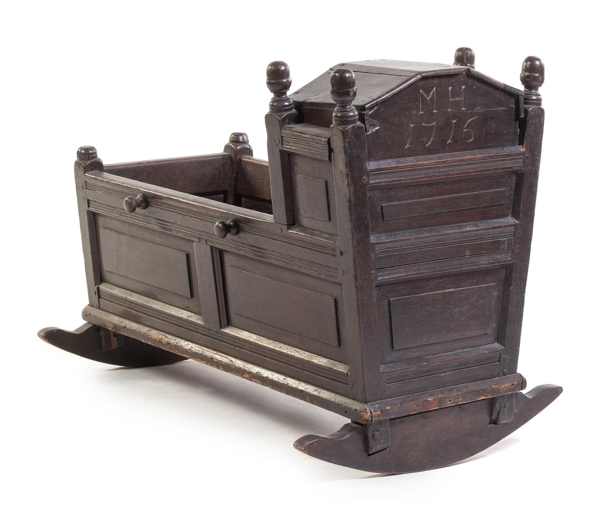 A French Oak Cradle Height 29 x width 38 inches. — 18TH CENTURY