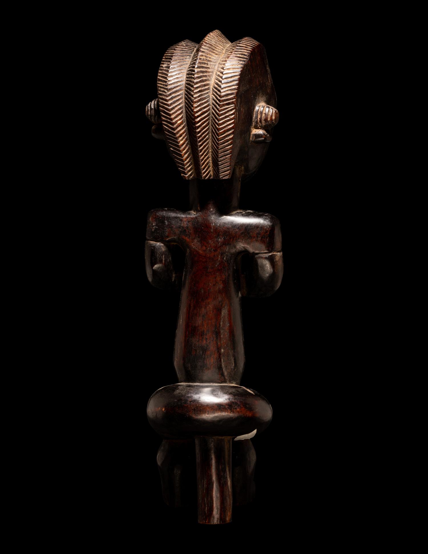 A Fang Wood Standing Figure