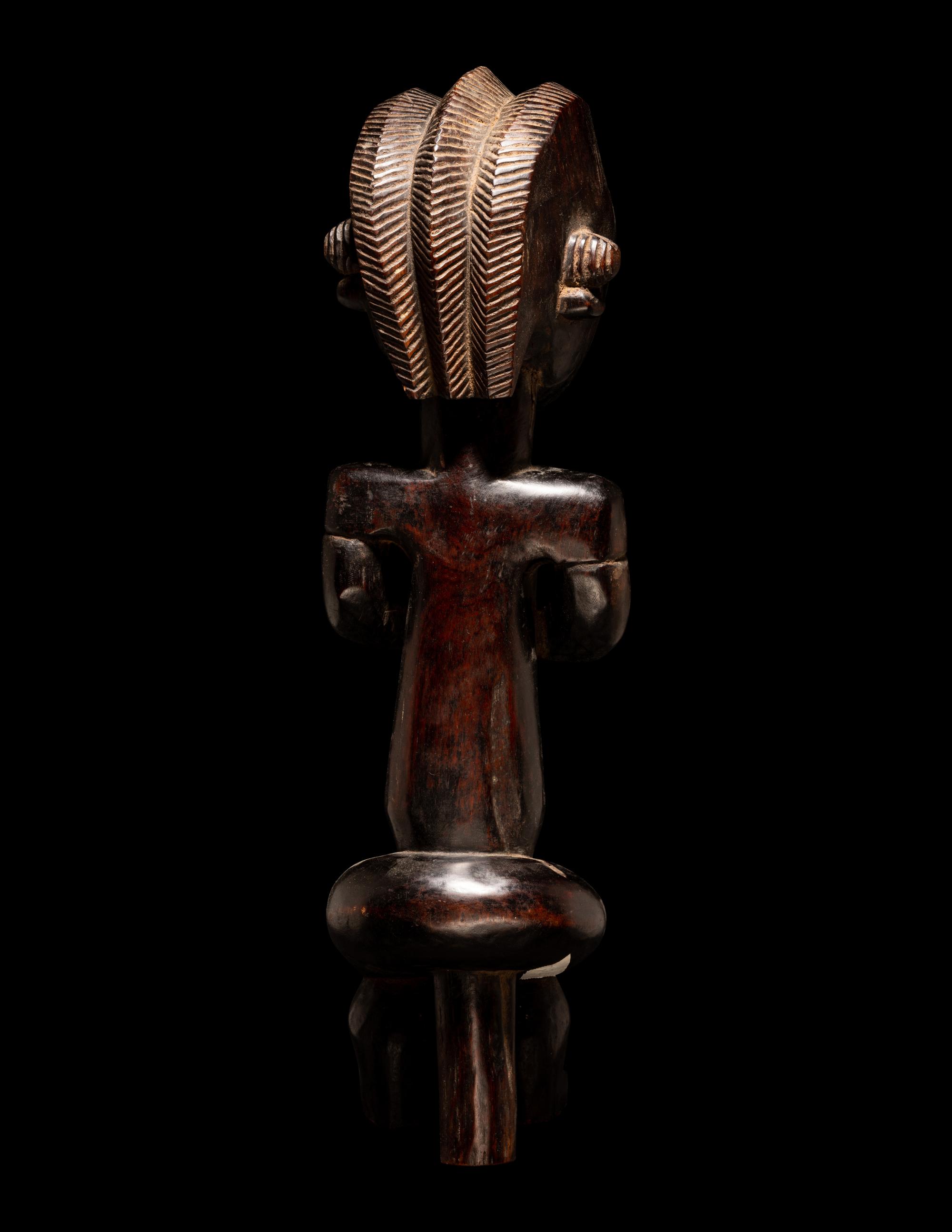 A Fang Wood Standing Figure