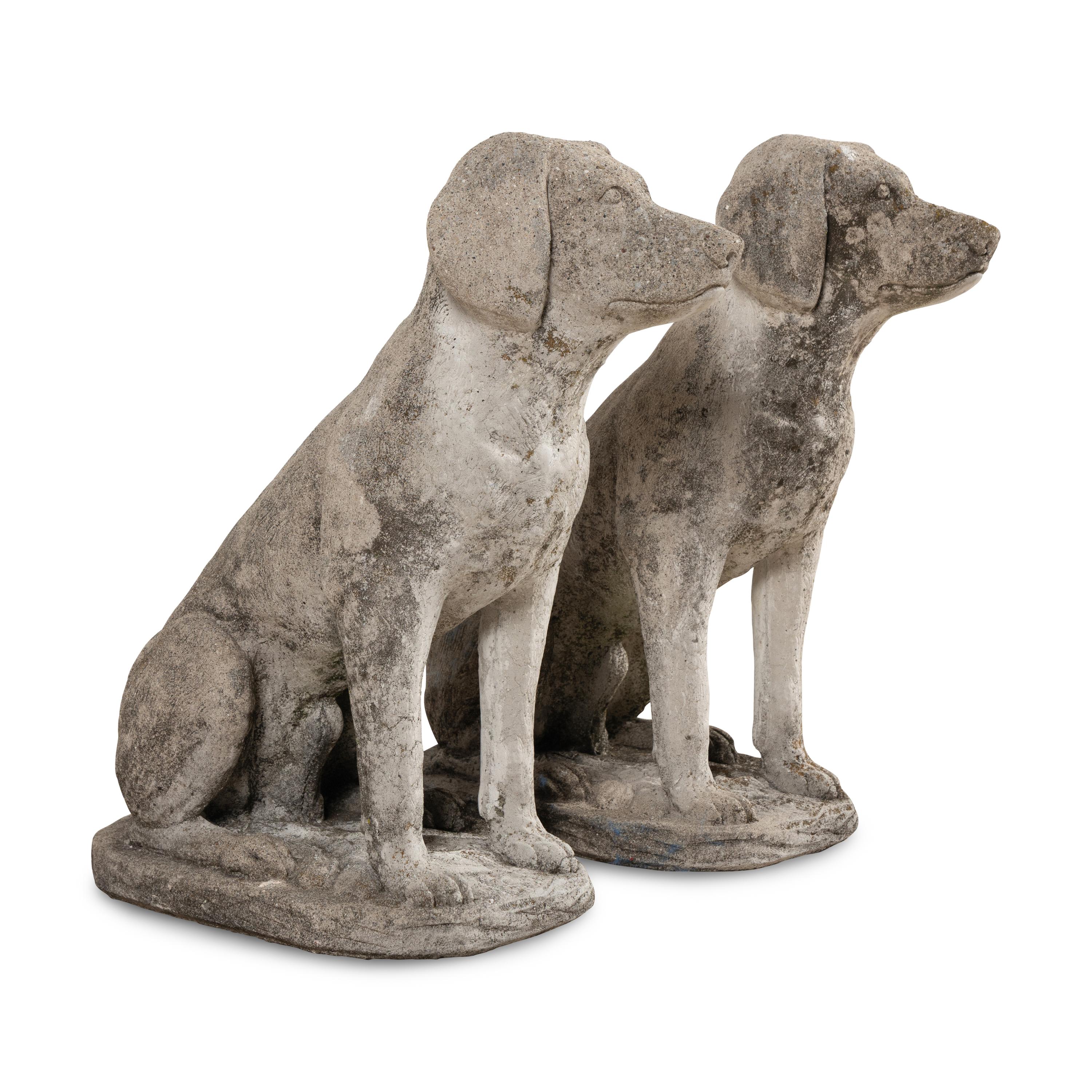 A Pair of Cast Stone Figures of Dogs