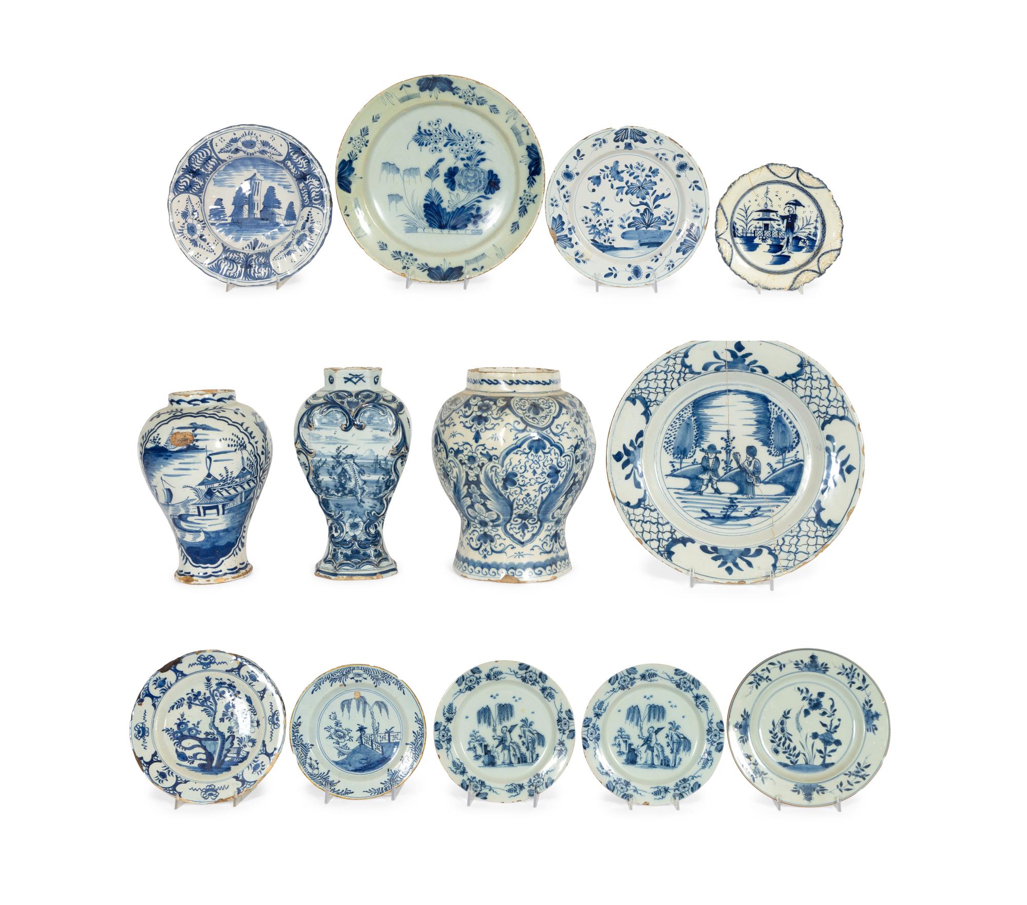 A Group of Thirteen Delft Earthenware Plates and Chargers