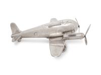A Large Silvered Metal Airplane-Form Table Top Smoking Set