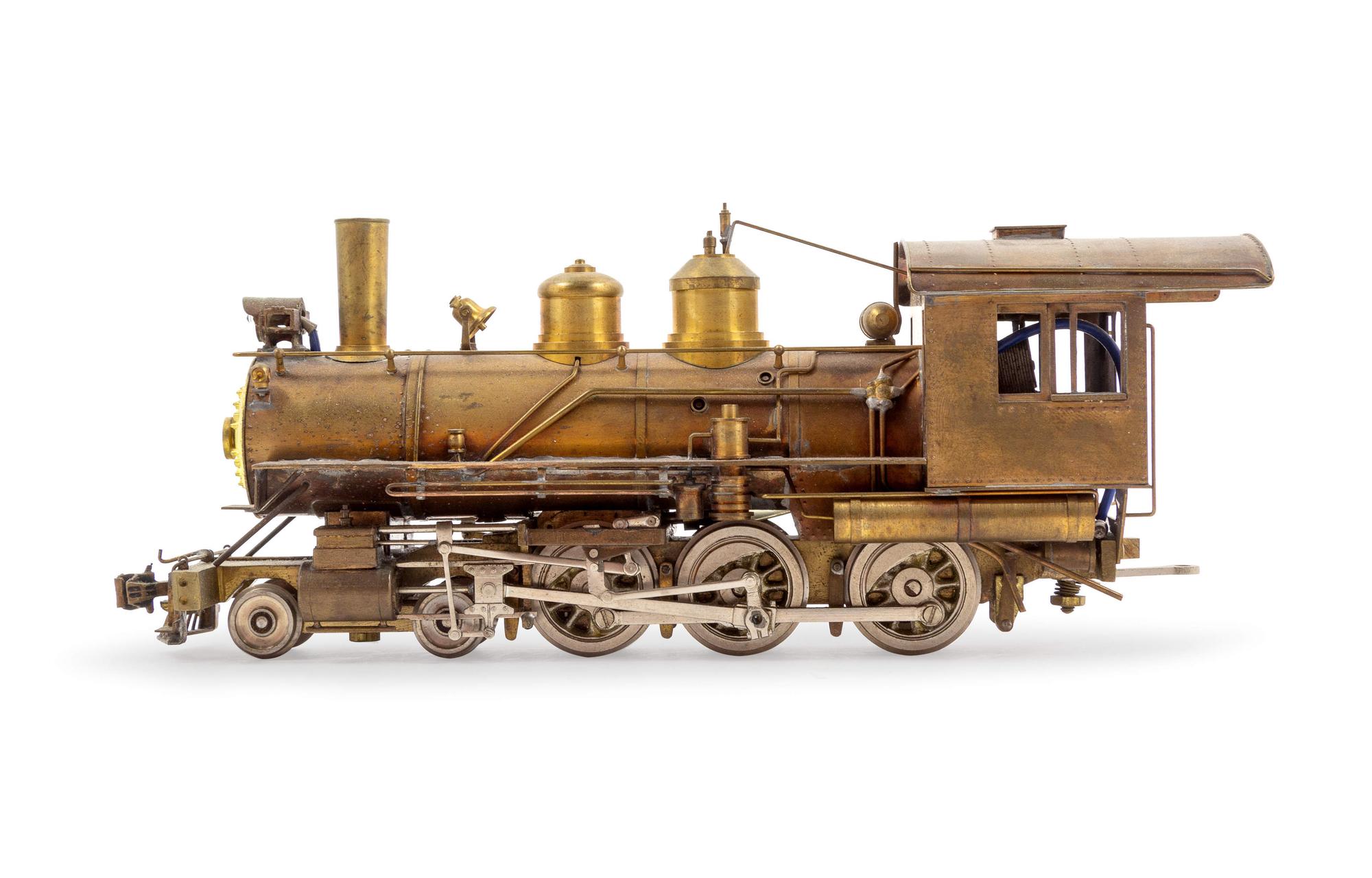A Group of Four Brass HO-Gauge Locomotives and Tenders