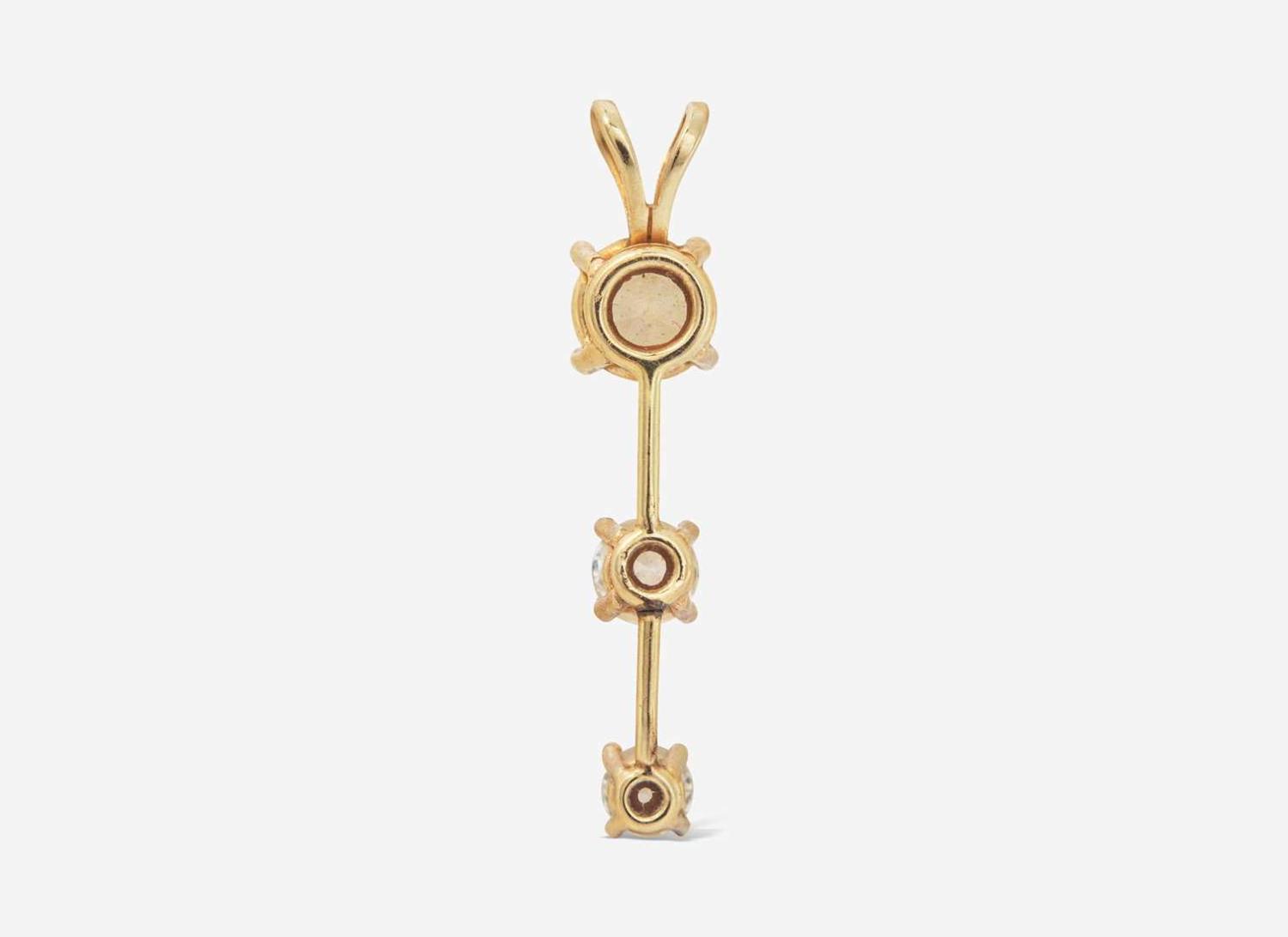 A 14K Yellow Gold and Diamond Pendant