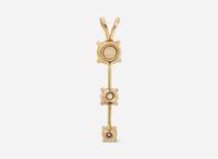A 14K Yellow Gold and Diamond Pendant