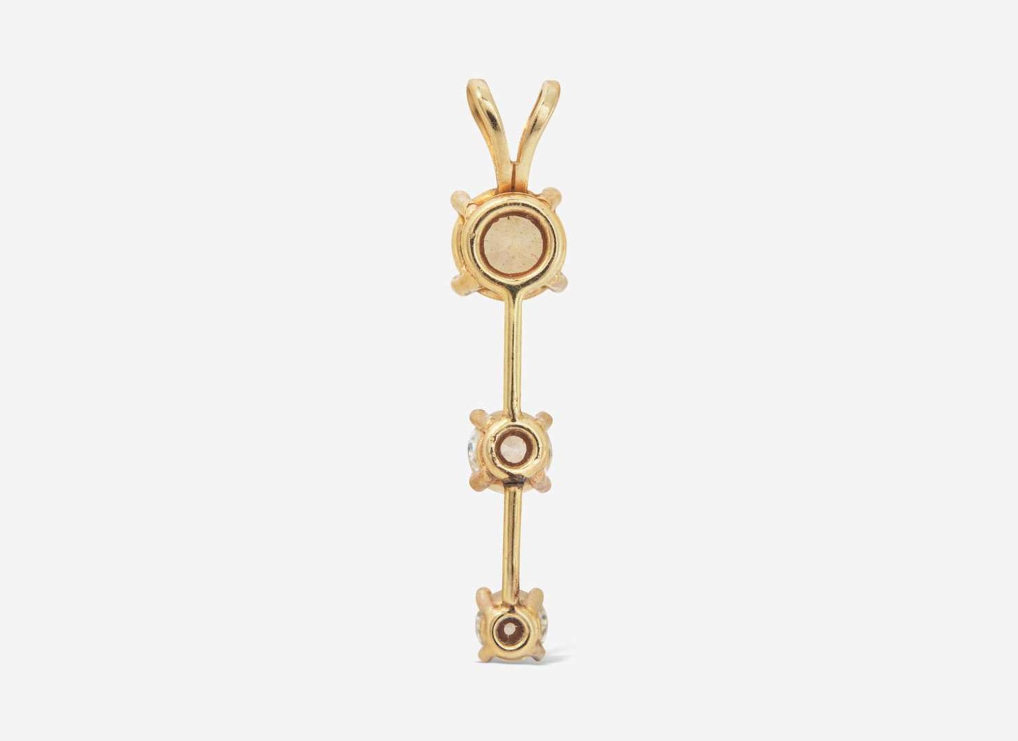 A 14K Yellow Gold and Diamond Pendant