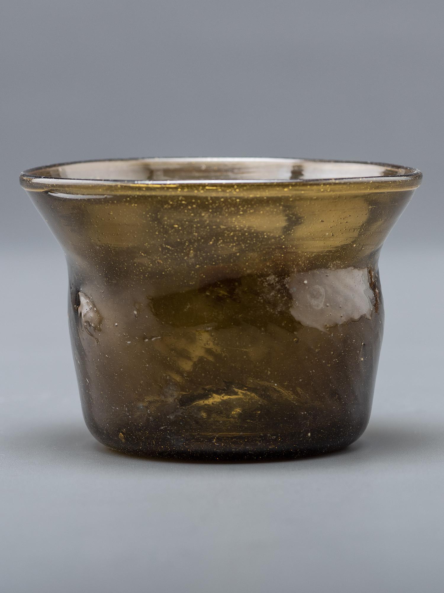 A Blown-Glass Eating Bowl in Olive Green