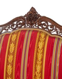 A Renaissance Revival Laminated and Carved Rosewood Three-Piece Parlor Suite