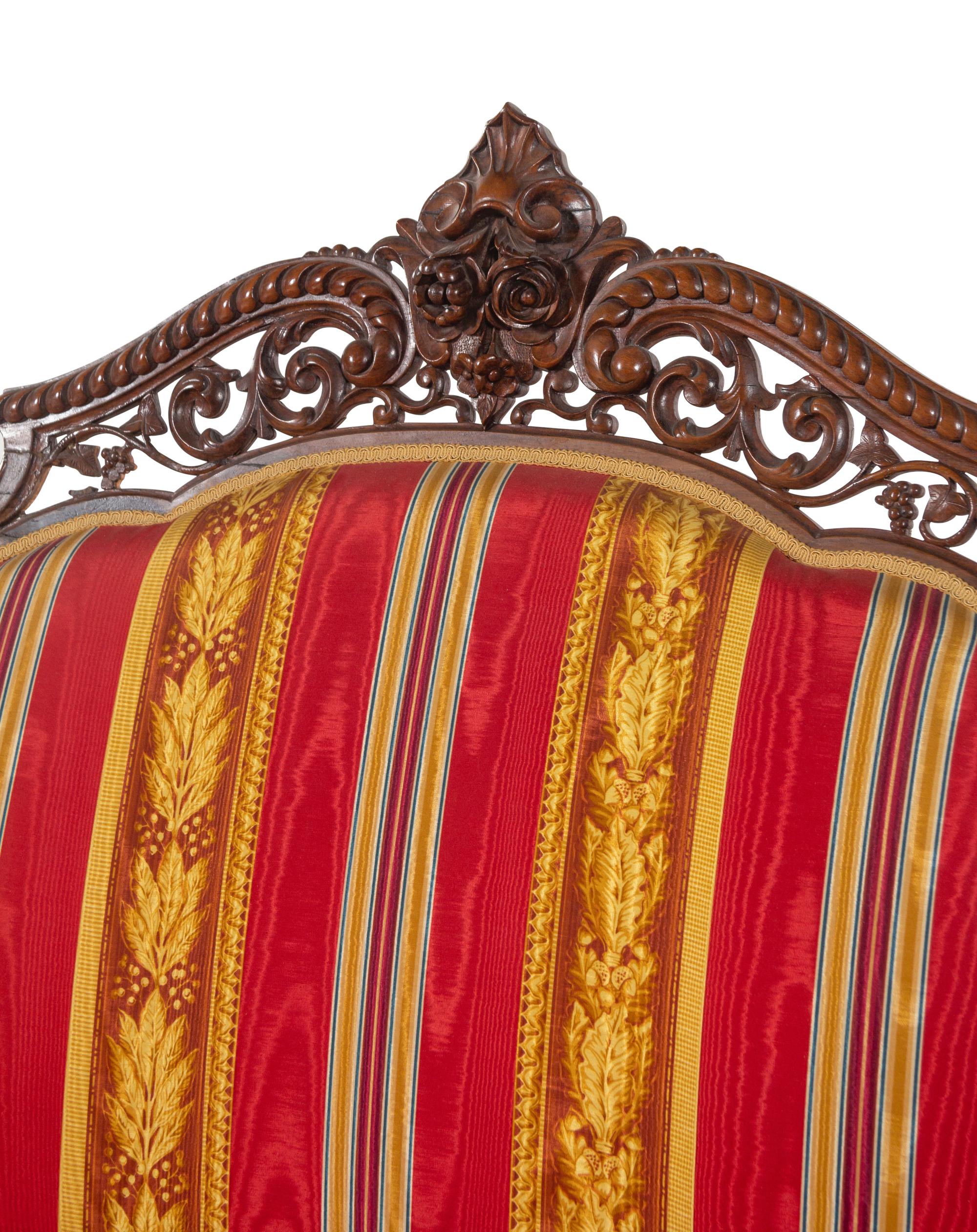 A Renaissance Revival Laminated and Carved Rosewood Three-Piece Parlor Suite