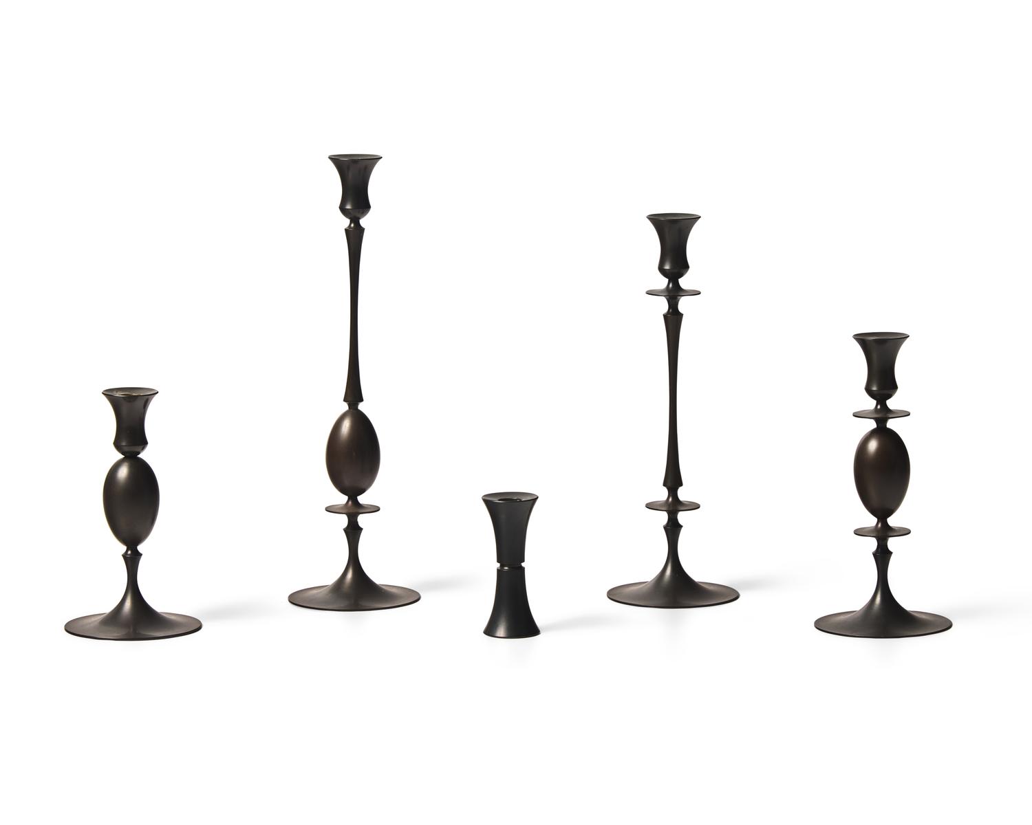 Group of 5 bronze candlesticks
