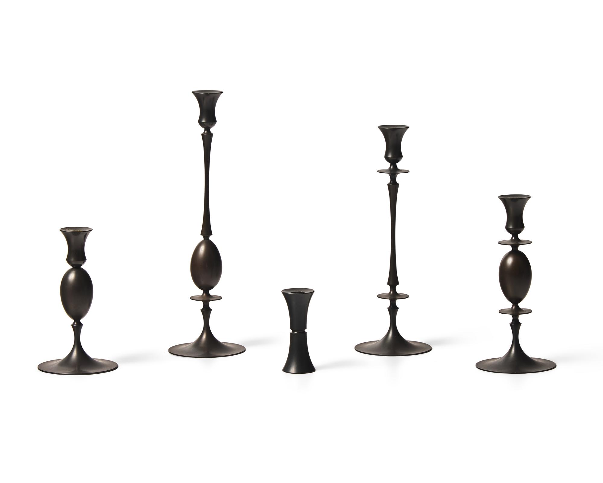 Group of 5 bronze candlesticks
