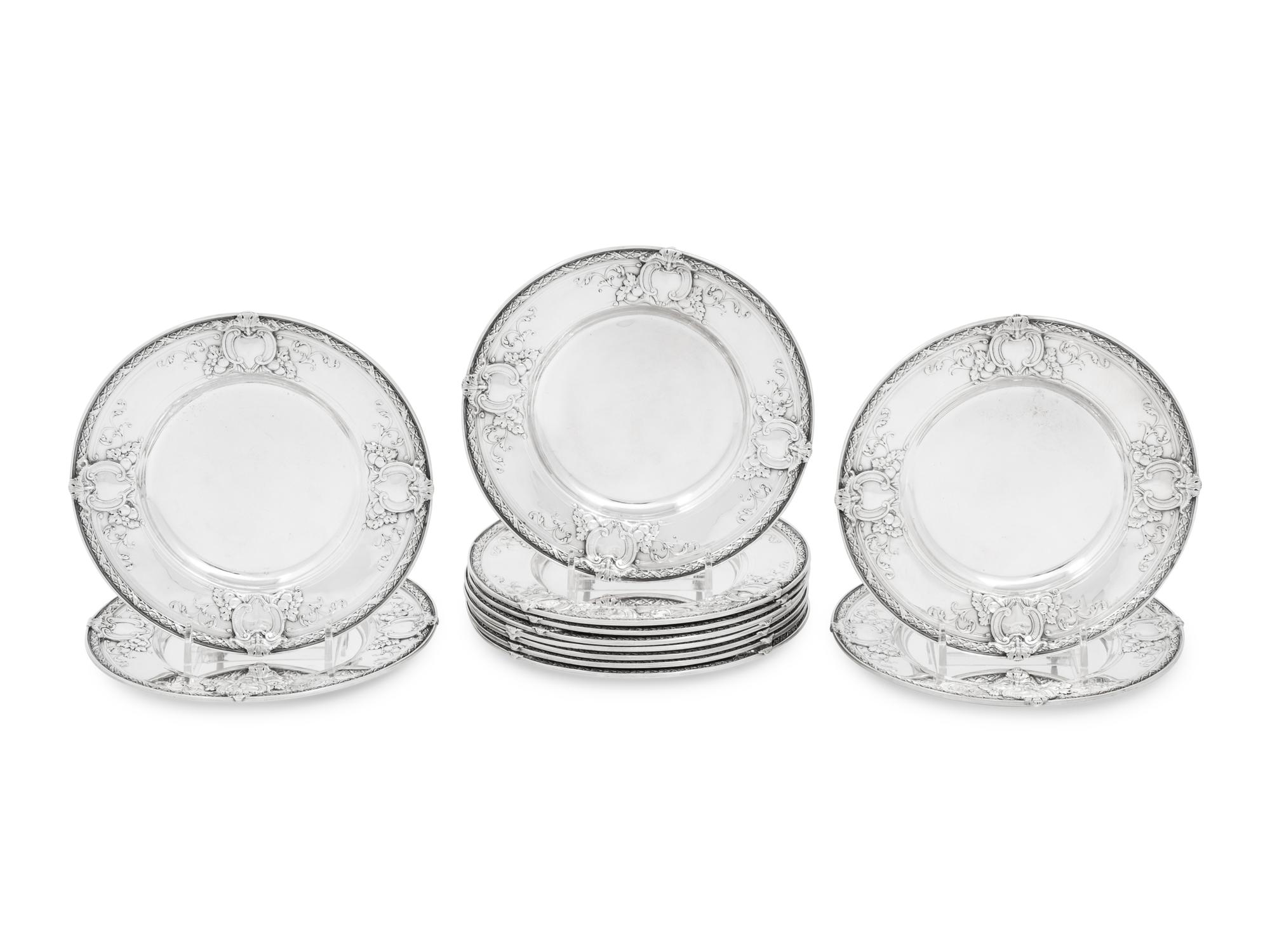A Set of Twelve American Silver Bread Plates