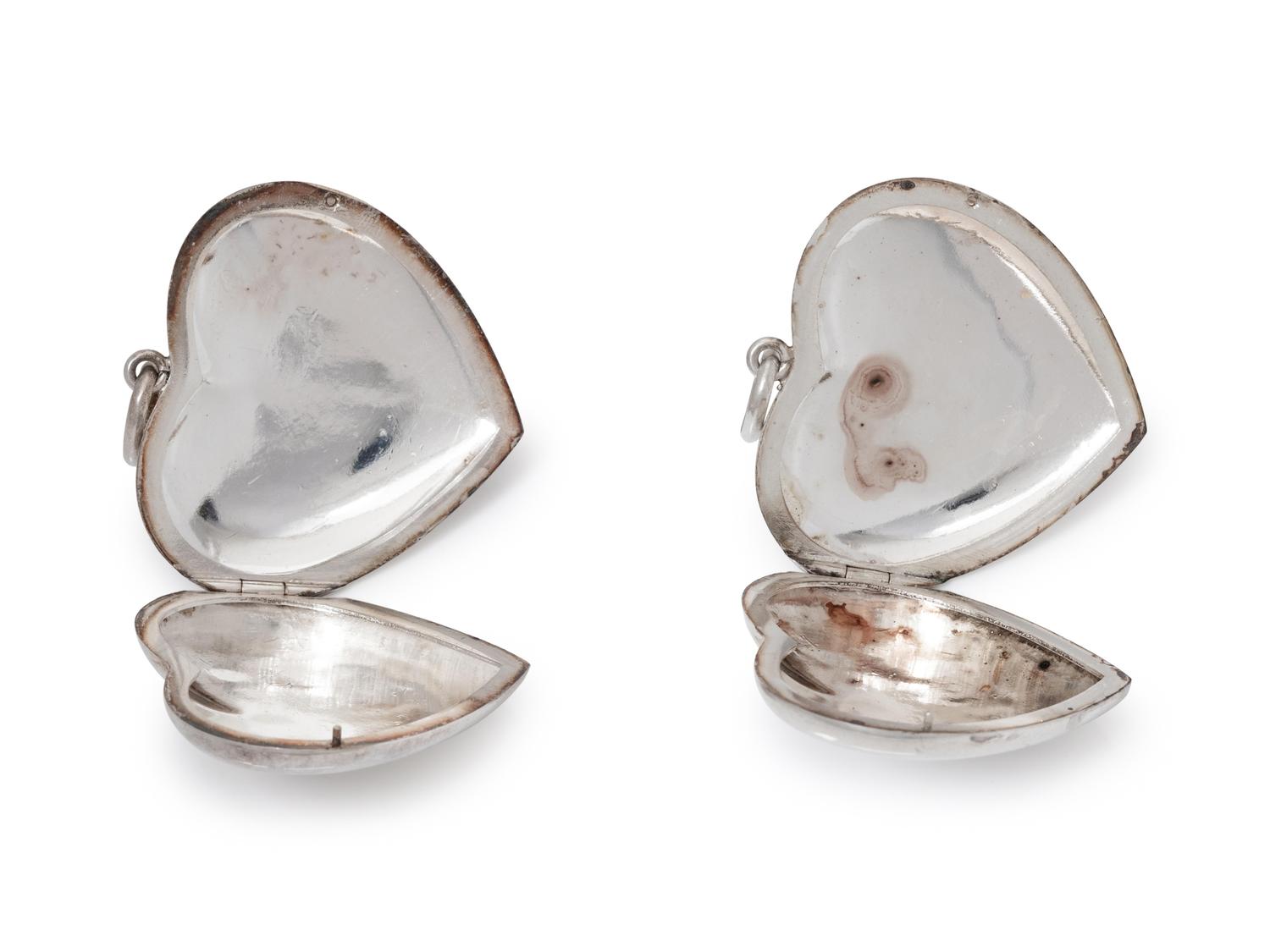 A Collection of Sterling Silver Heart Lockets,