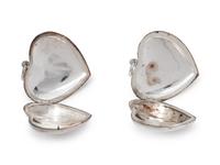 A Collection of Sterling Silver Heart Lockets,