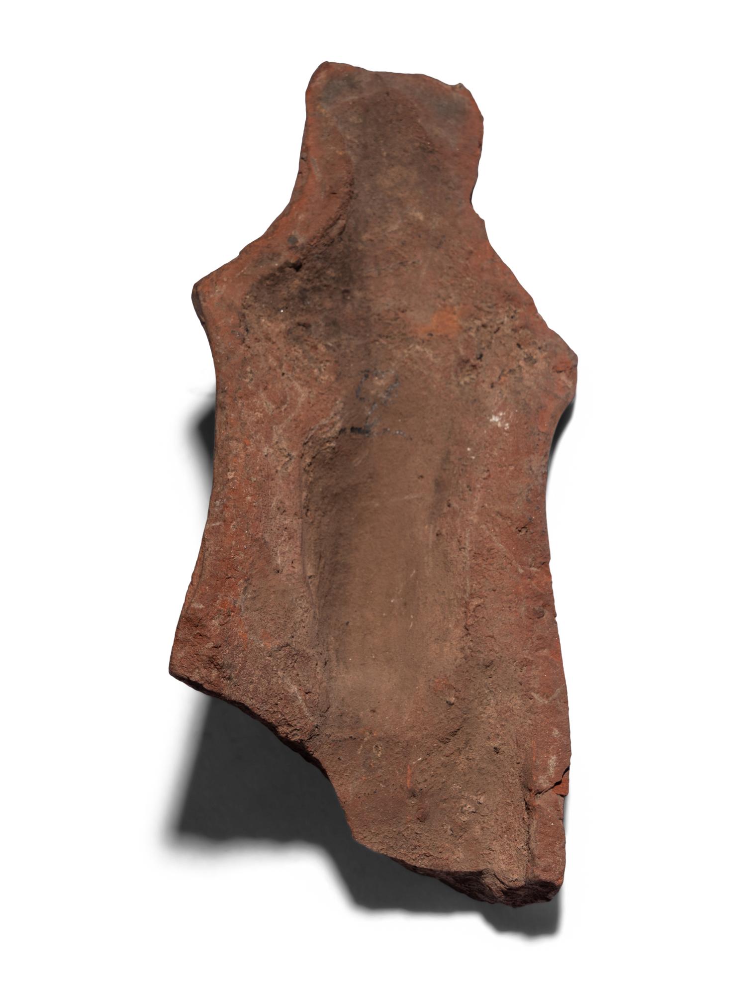 An Egyptian Terracotta Head of the God Osiris