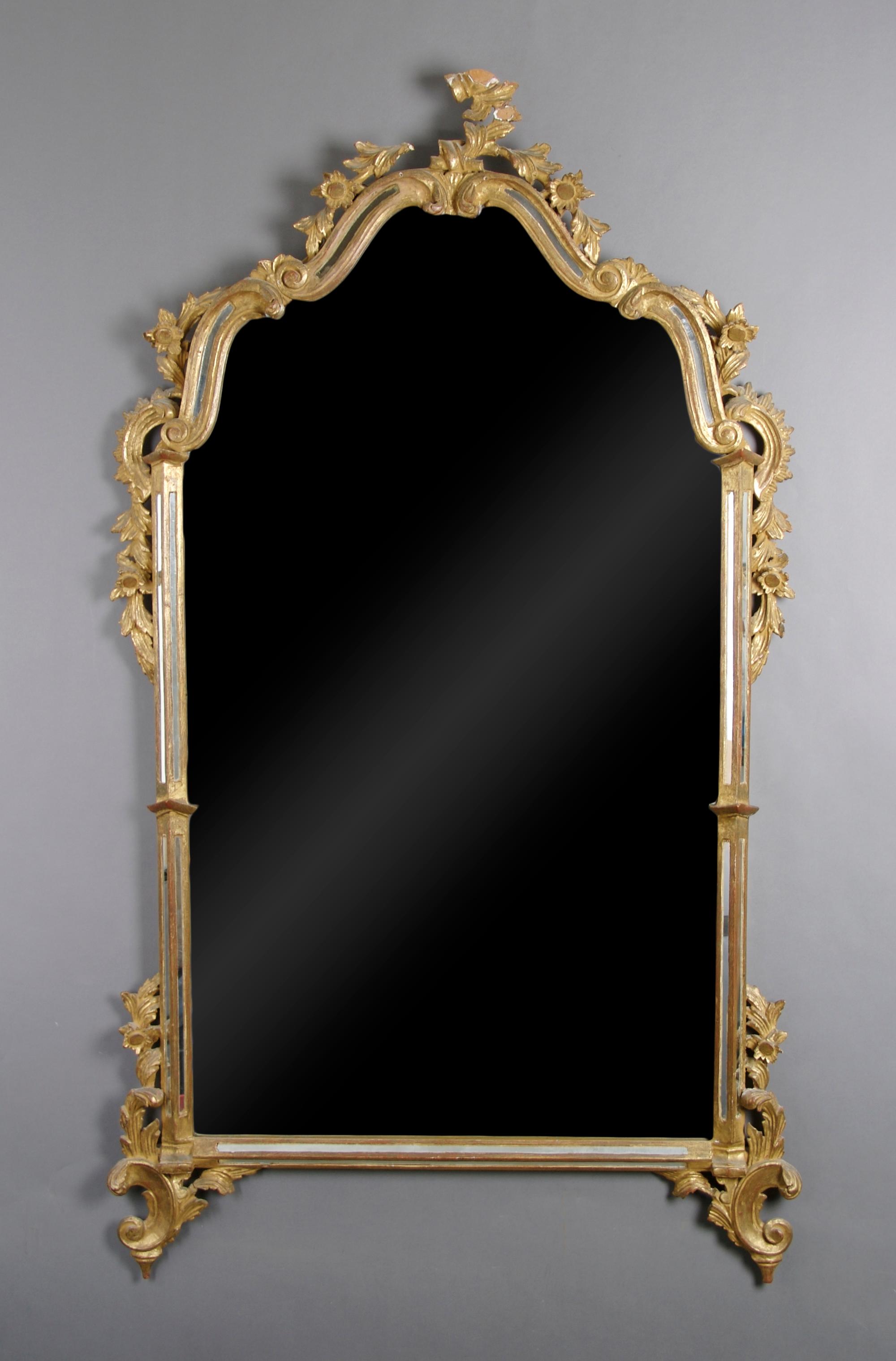 A Continental Giltwood Mirror, Height 52 x width 30 inches.