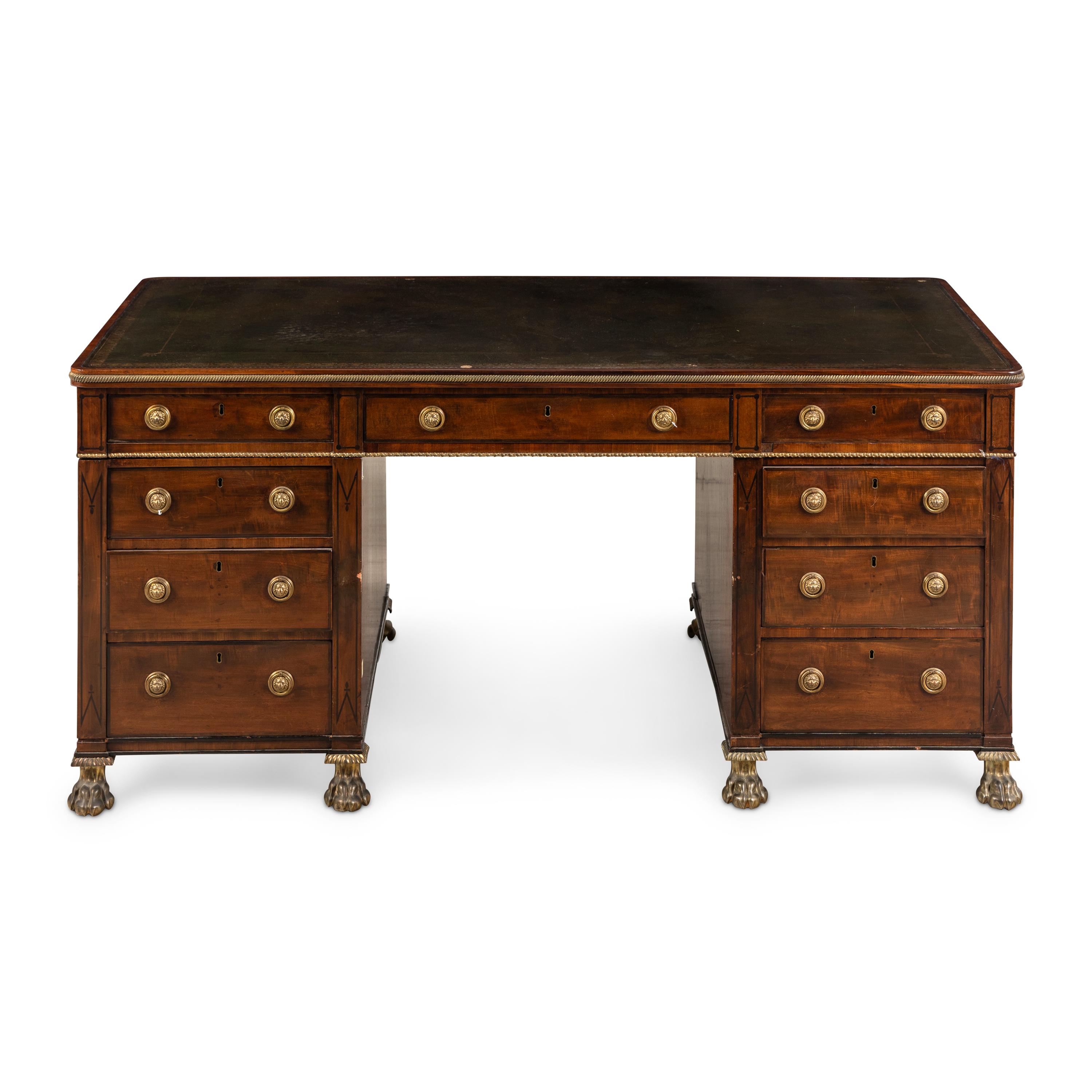 A Regency Mahogany, Ebony Inlaid and Ormolu Mounted Partner's Desk