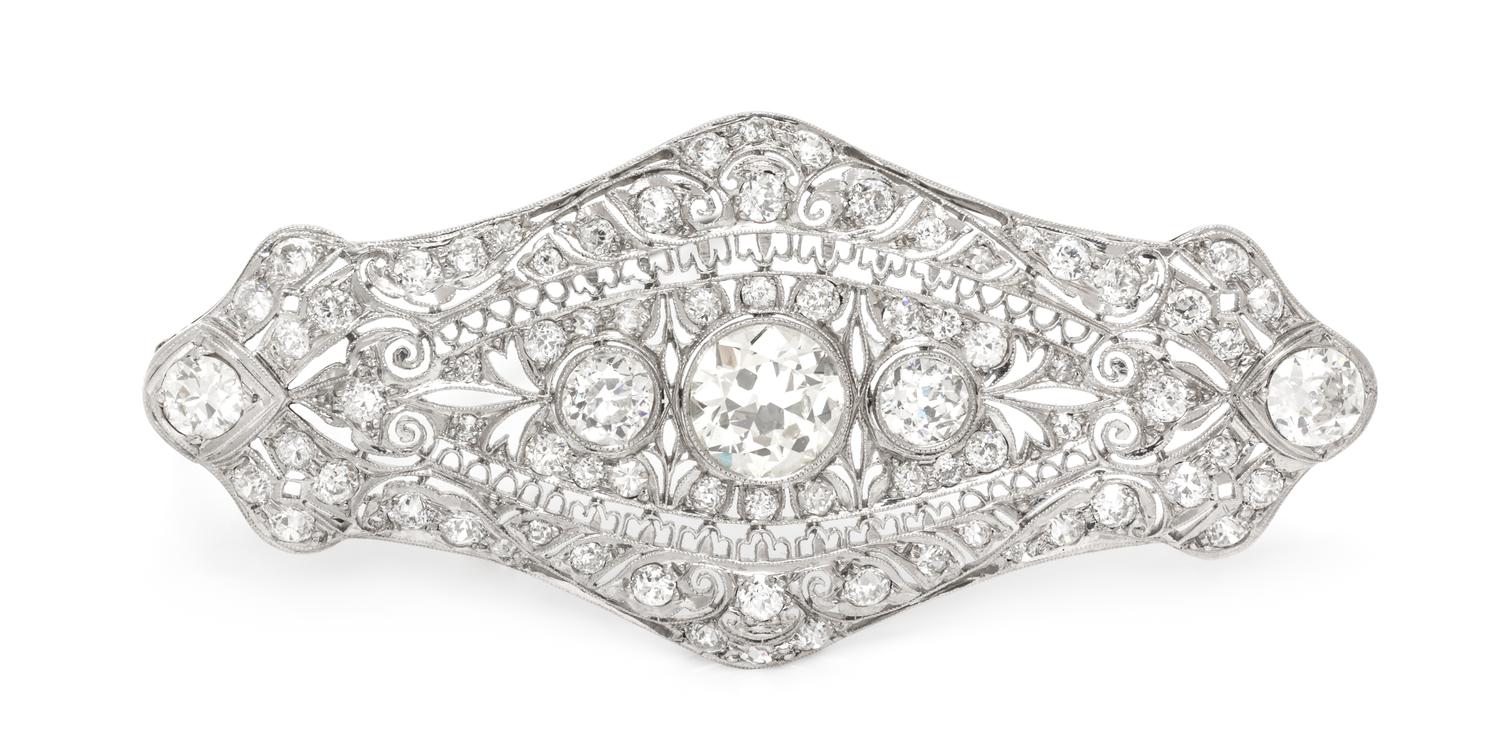 An Art Deco Platinum and Diamond Pendant/Brooch, 11.90 dwts.