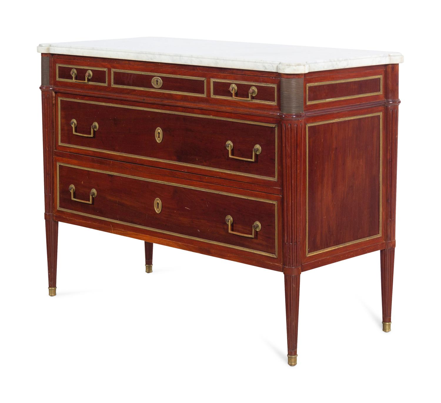 A Directoire Style Bronze Mounted Mahogany Marble-Top Commode