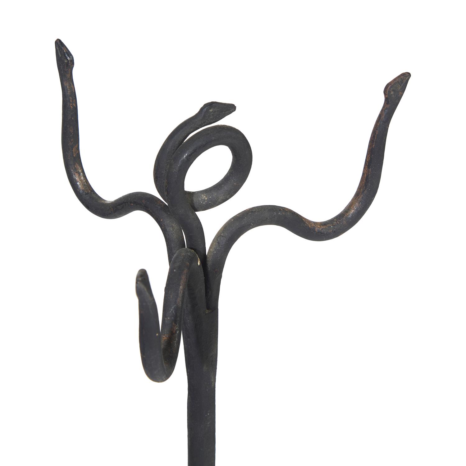 A Group of Four Arts and Crafts Wrought Iron Fireplace Tools